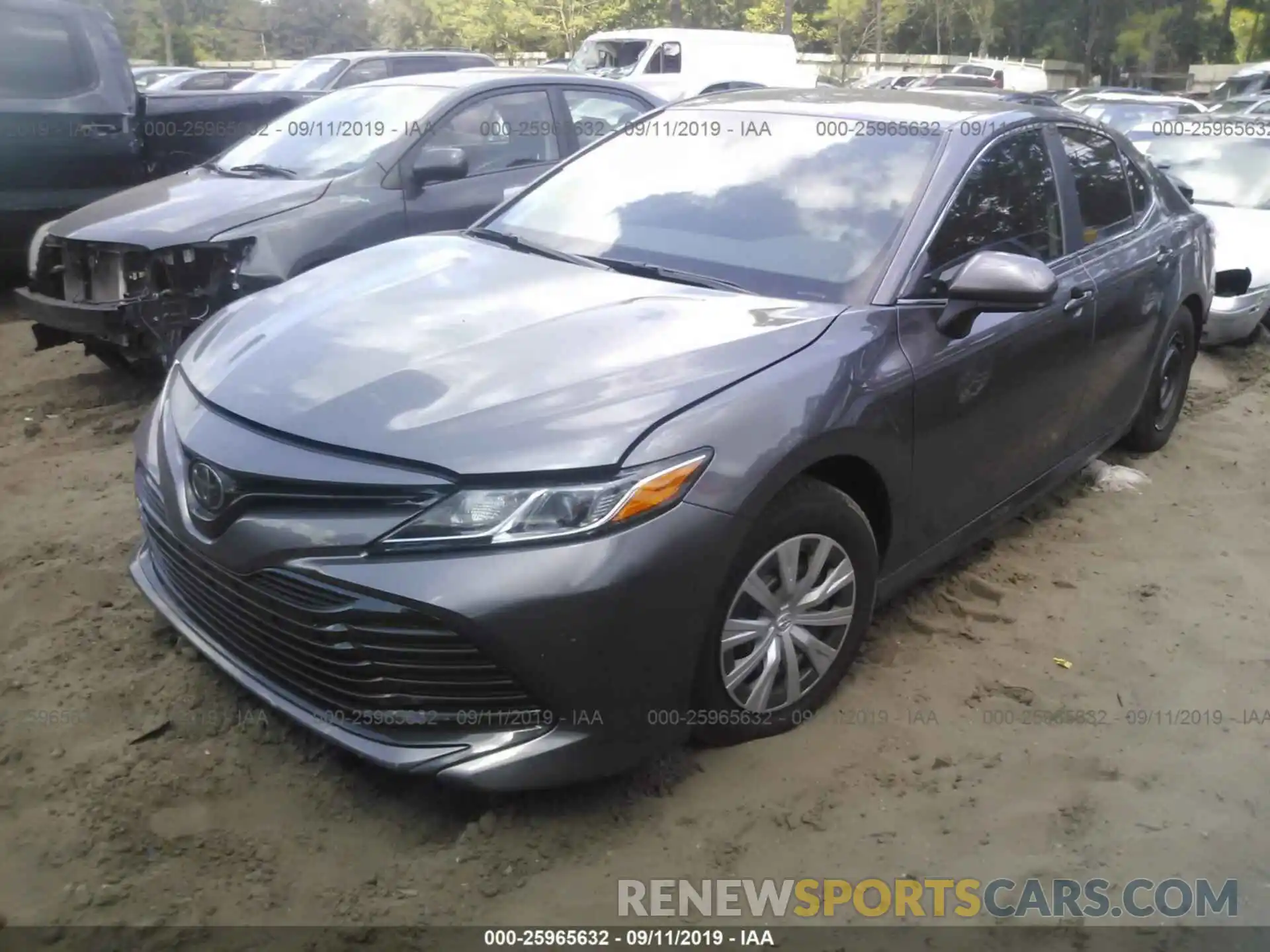 2 Photograph of a damaged car 4T1B11HK4KU743253 TOYOTA CAMRY 2019