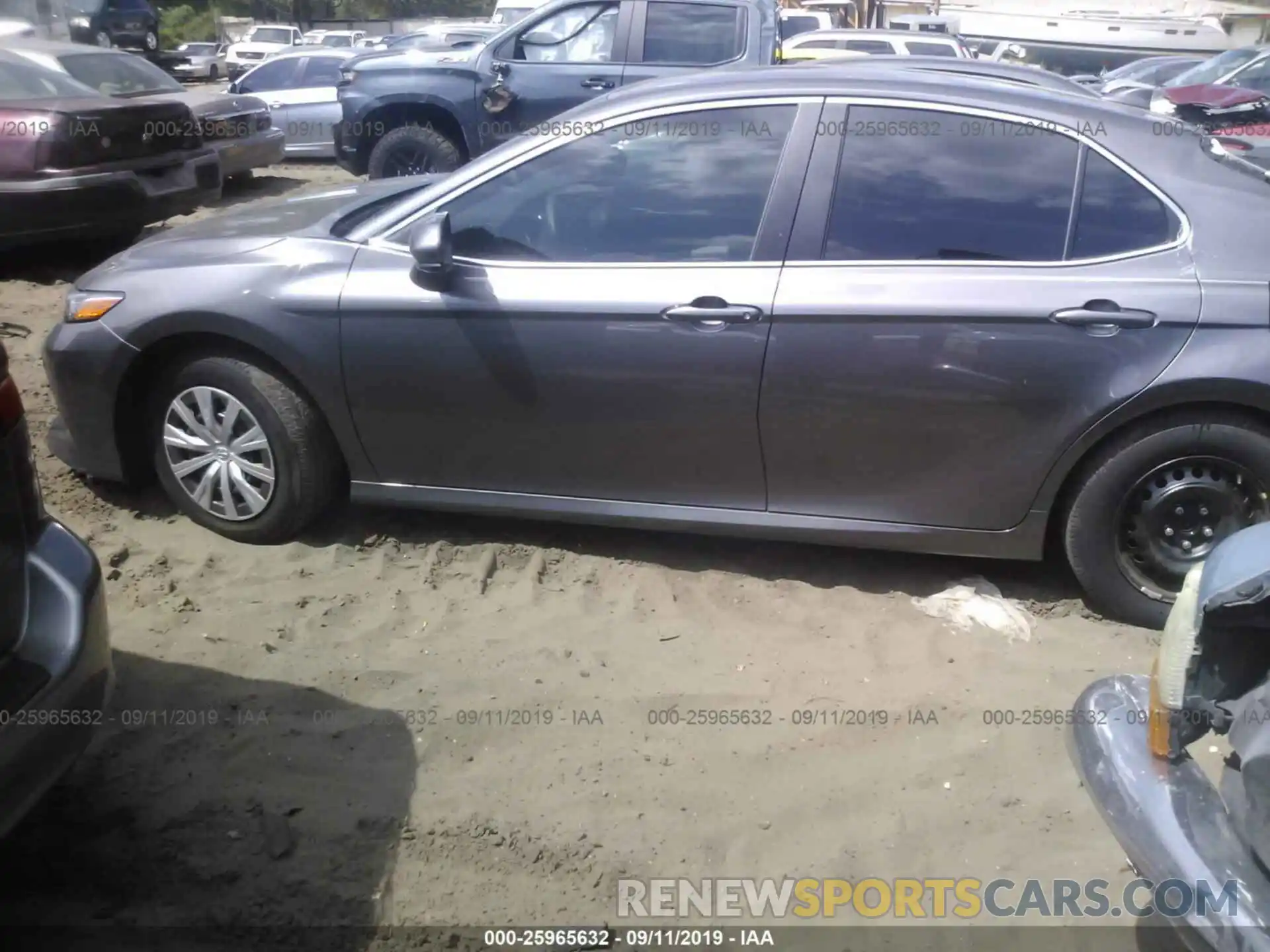 3 Photograph of a damaged car 4T1B11HK4KU743253 TOYOTA CAMRY 2019