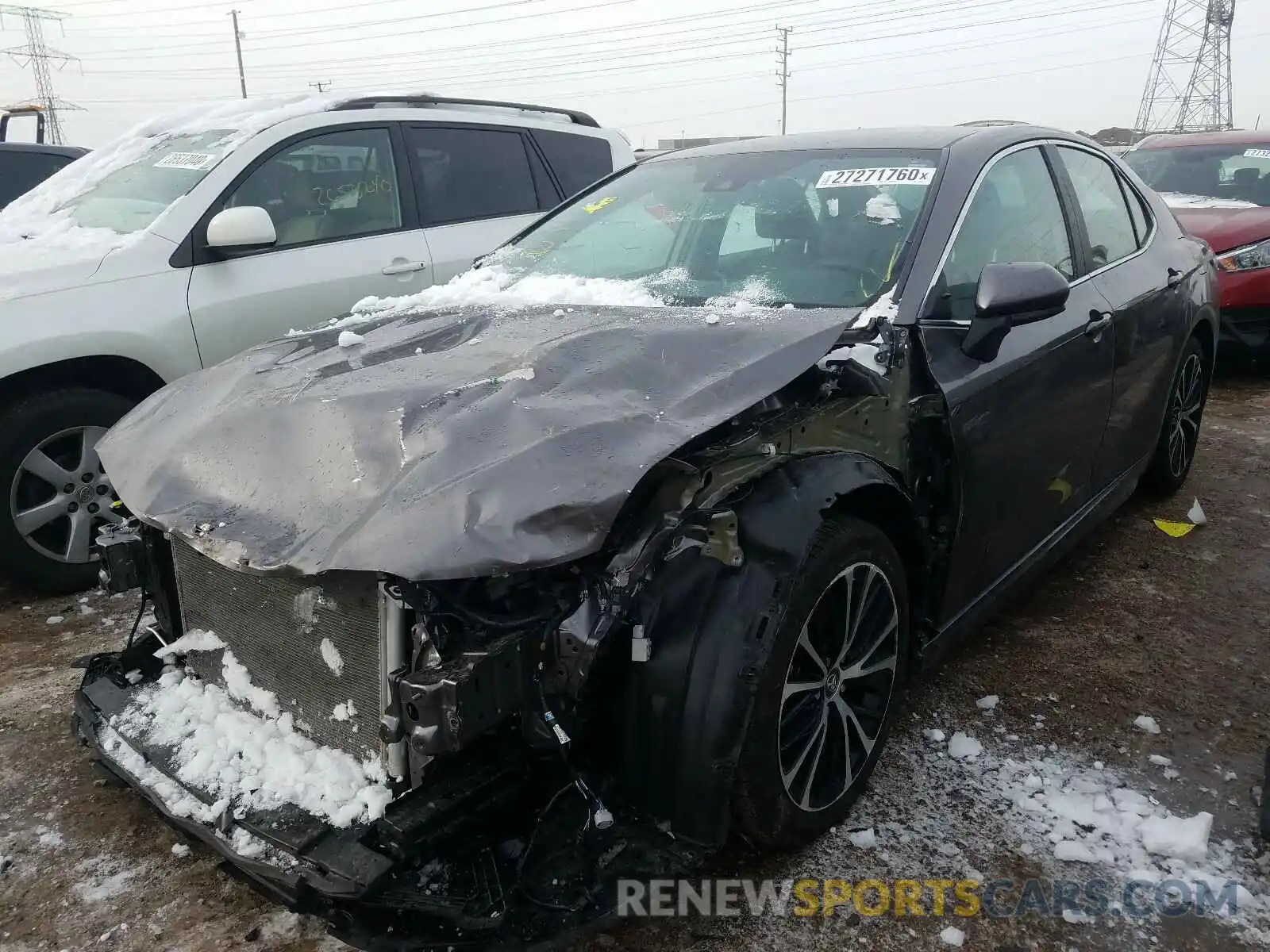 2 Photograph of a damaged car 4T1B11HK4KU743608 TOYOTA CAMRY 2019