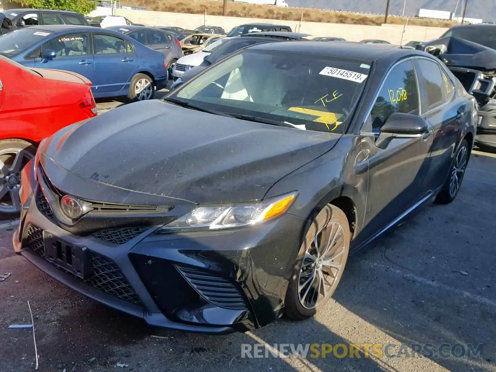 2 Photograph of a damaged car 4T1B11HK4KU743706 TOYOTA CAMRY 2019