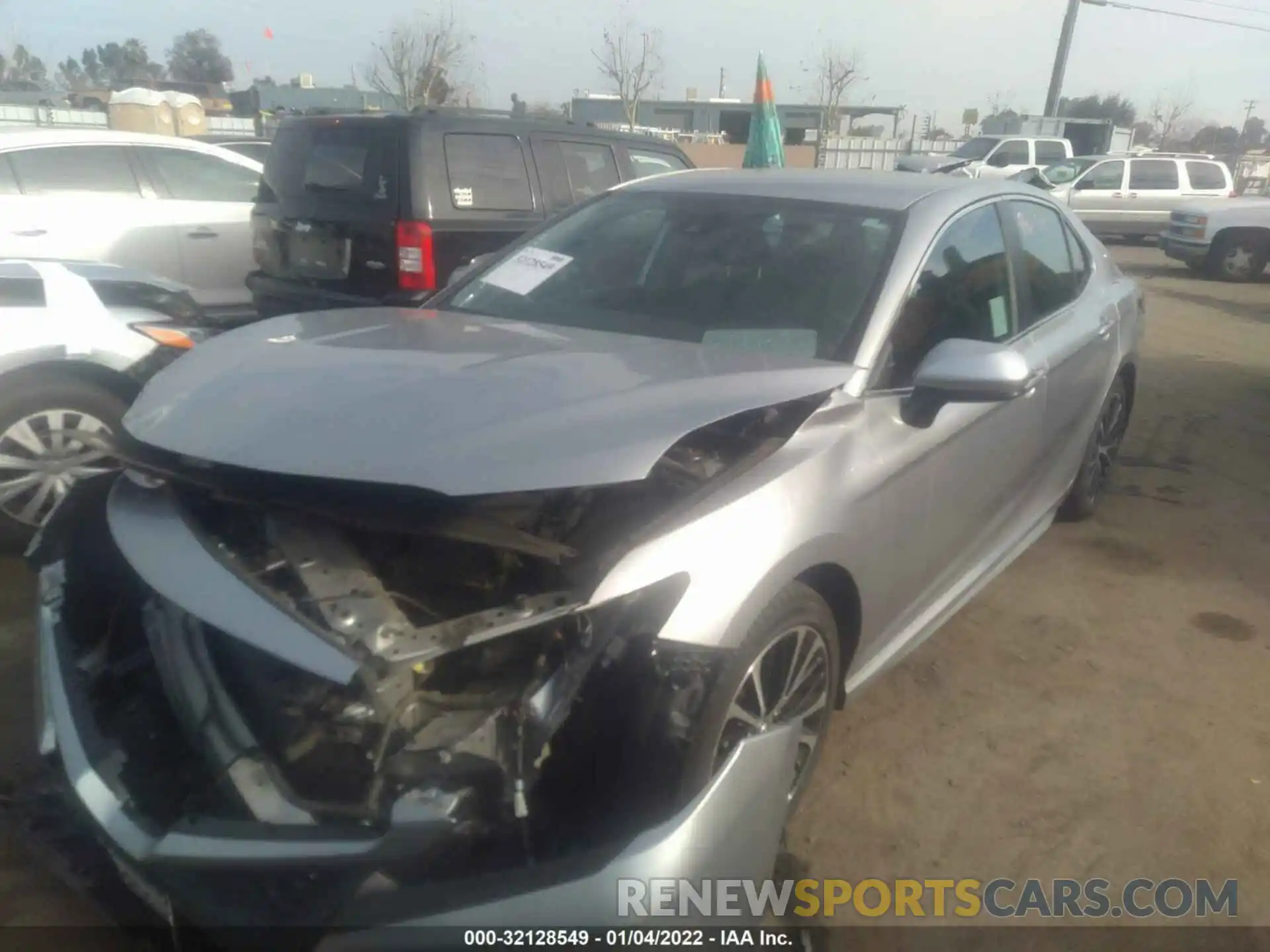 2 Photograph of a damaged car 4T1B11HK4KU743897 TOYOTA CAMRY 2019