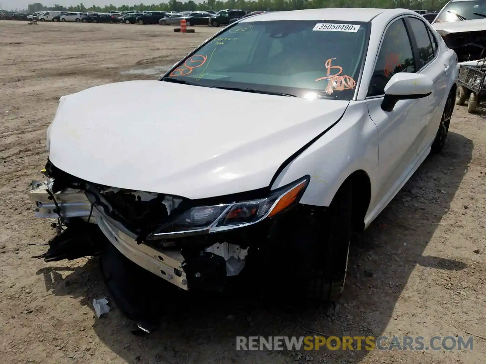 2 Photograph of a damaged car 4T1B11HK4KU744127 TOYOTA CAMRY 2019