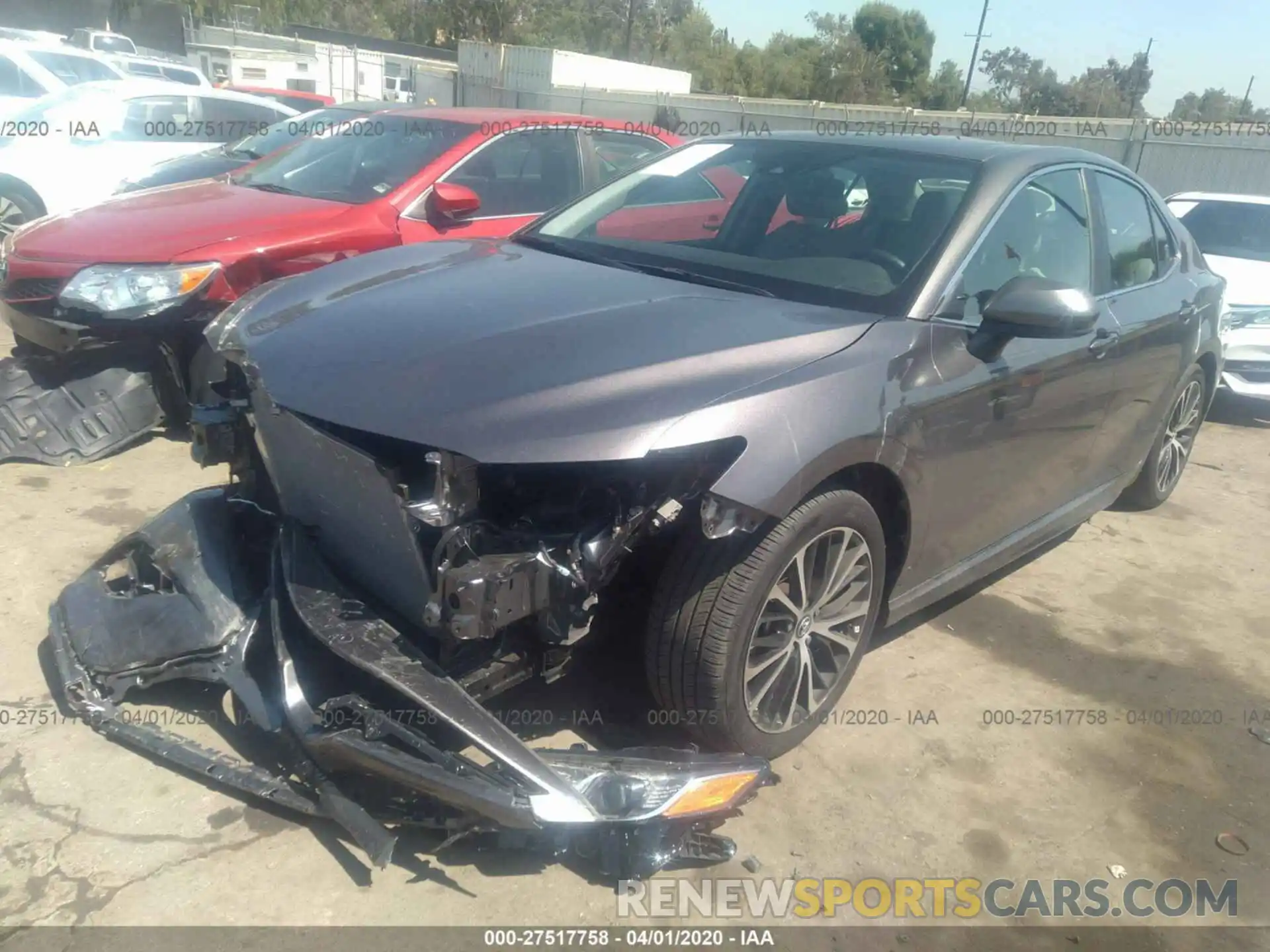 2 Photograph of a damaged car 4T1B11HK4KU744208 TOYOTA CAMRY 2019