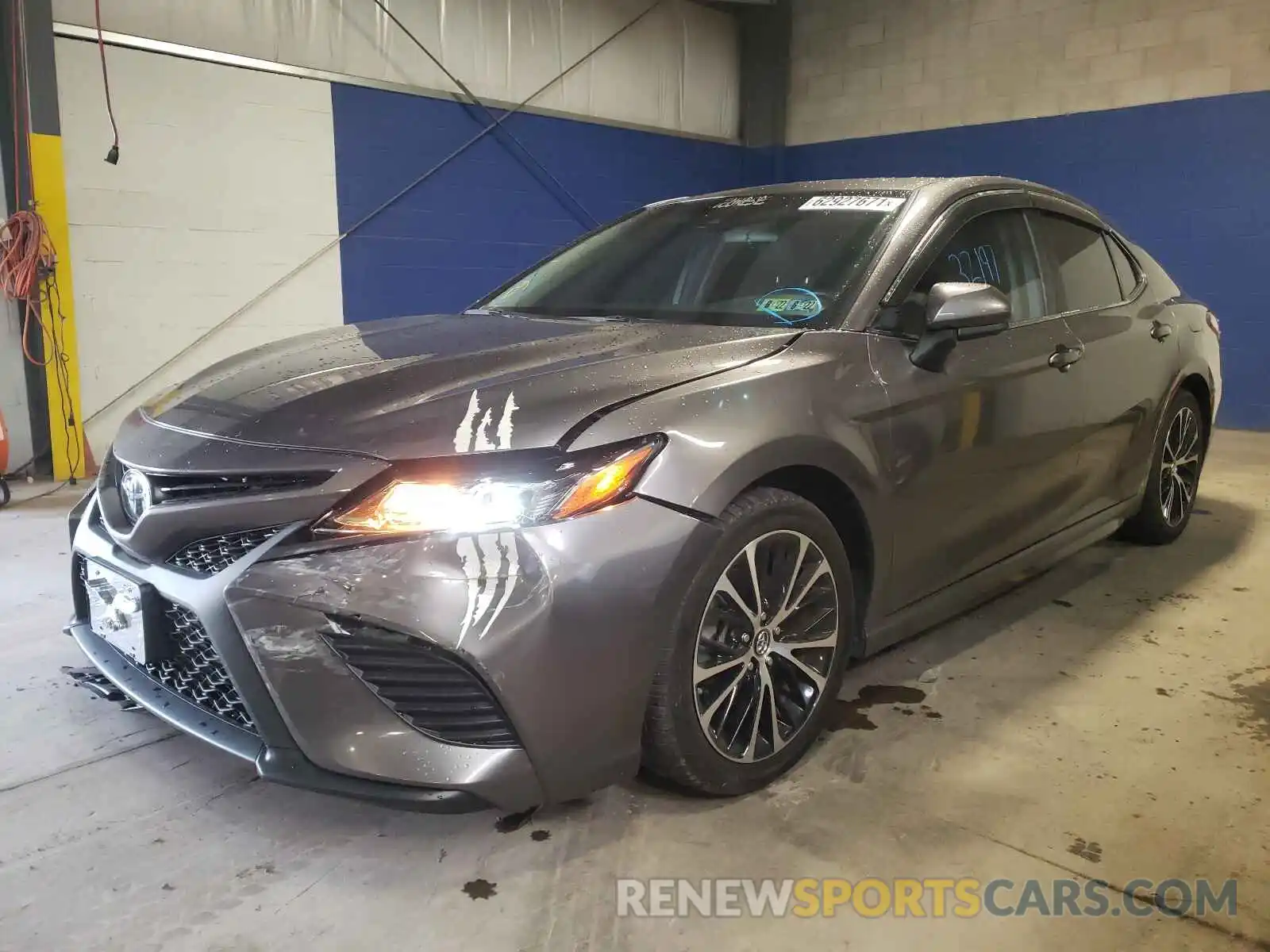 2 Photograph of a damaged car 4T1B11HK4KU744709 TOYOTA CAMRY 2019