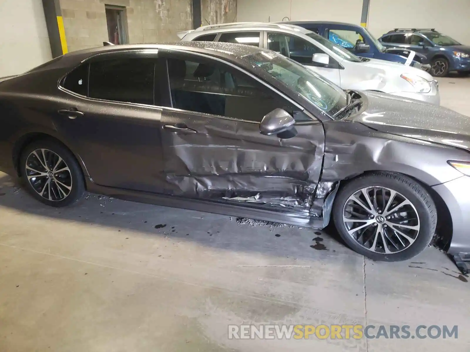 9 Photograph of a damaged car 4T1B11HK4KU744709 TOYOTA CAMRY 2019