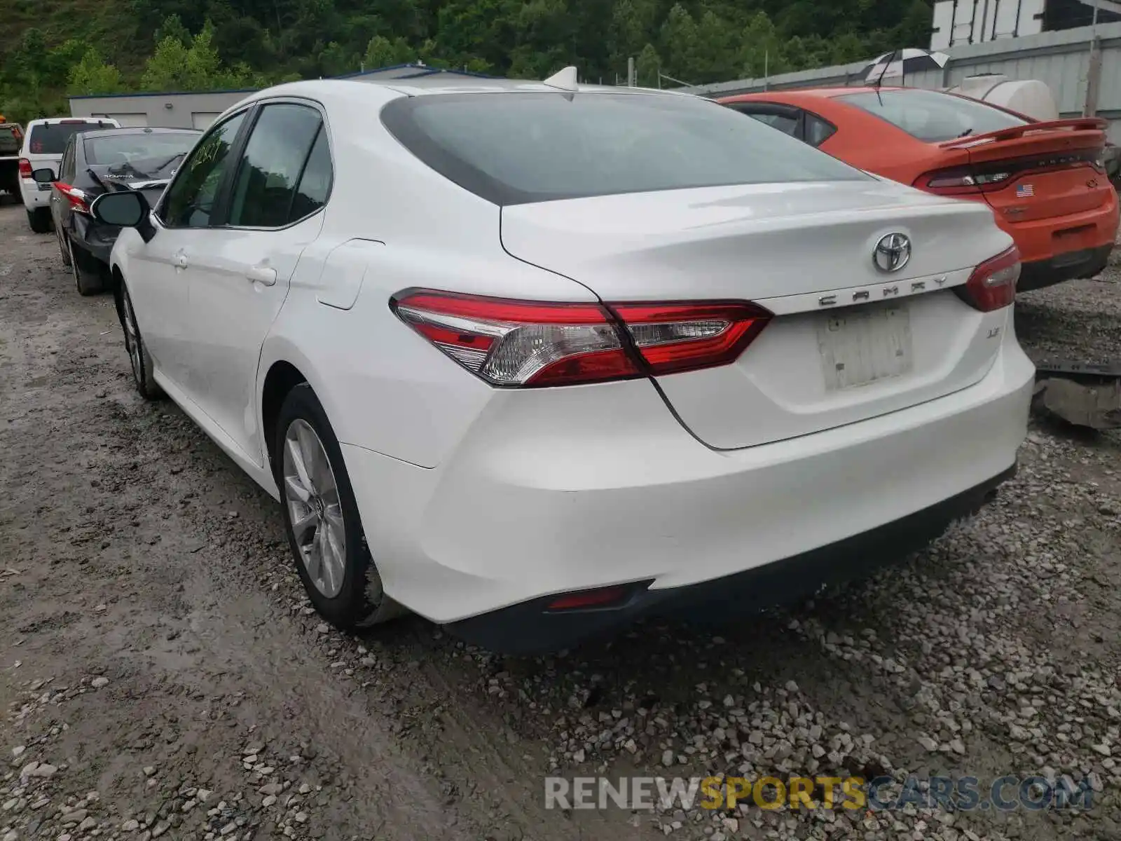 3 Photograph of a damaged car 4T1B11HK4KU746041 TOYOTA CAMRY 2019