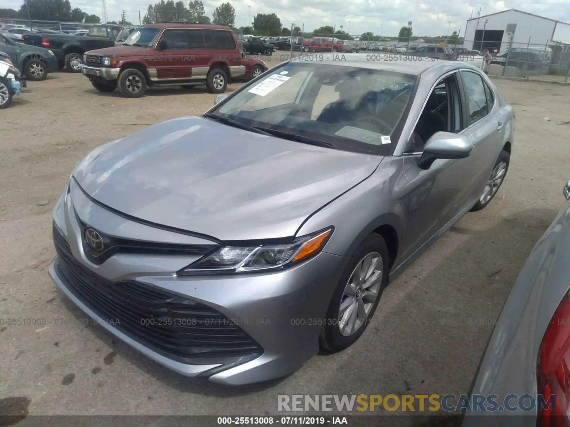 2 Photograph of a damaged car 4T1B11HK4KU746086 TOYOTA CAMRY 2019