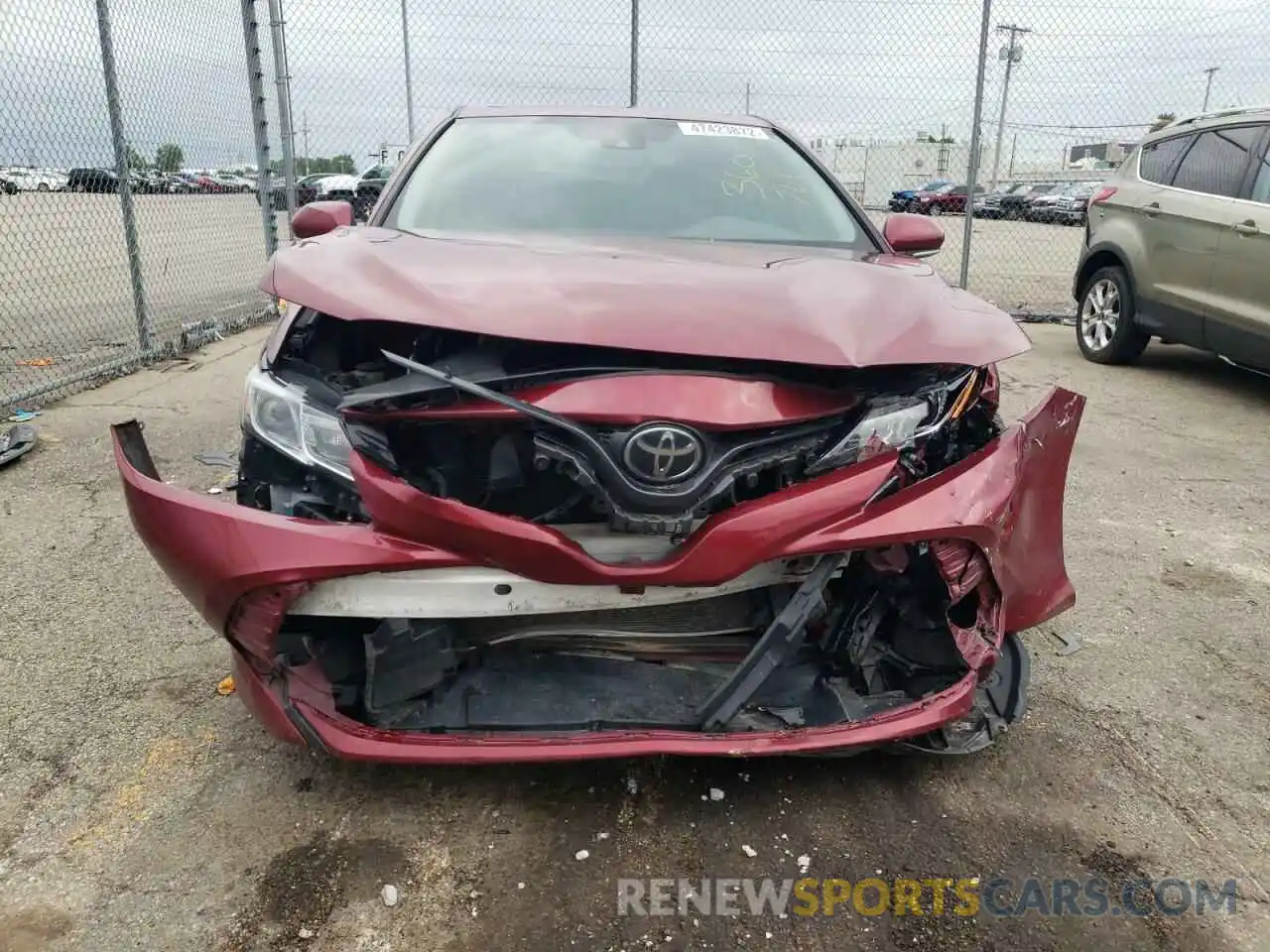 7 Photograph of a damaged car 4T1B11HK4KU746153 TOYOTA CAMRY 2019