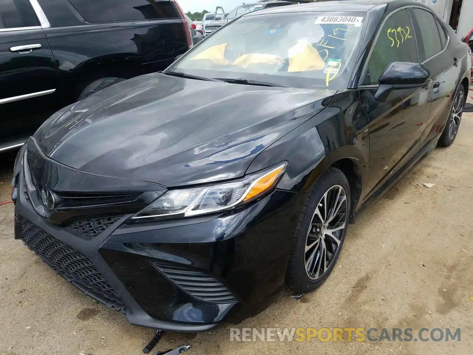 2 Photograph of a damaged car 4T1B11HK4KU746511 TOYOTA CAMRY 2019