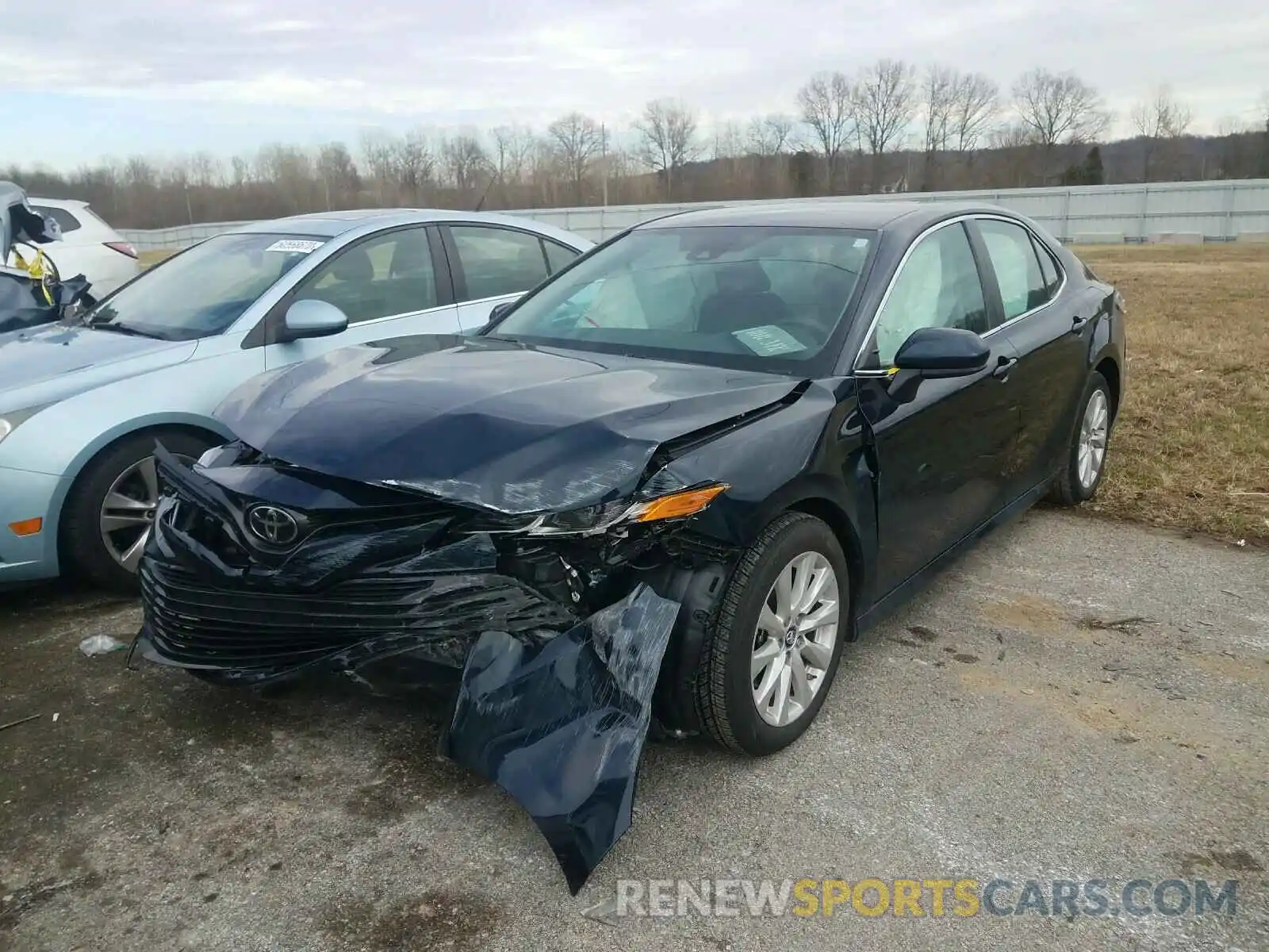 2 Photograph of a damaged car 4T1B11HK4KU747139 TOYOTA CAMRY 2019