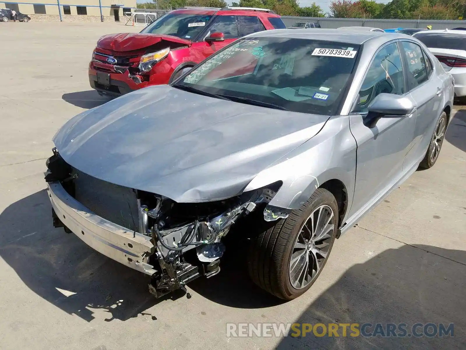 2 Photograph of a damaged car 4T1B11HK4KU748047 TOYOTA CAMRY 2019