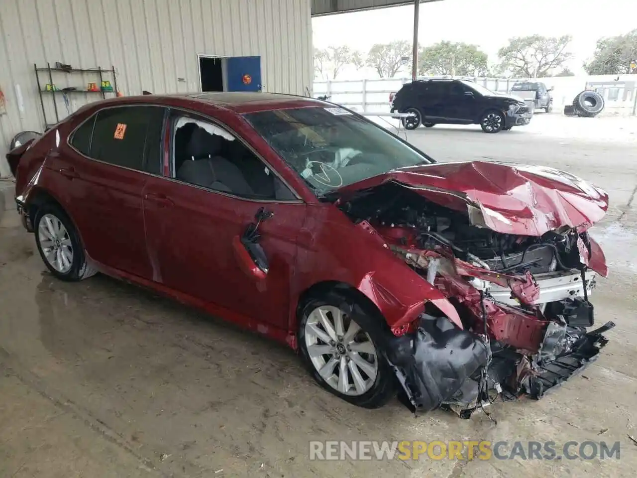 4 Photograph of a damaged car 4T1B11HK4KU751367 TOYOTA CAMRY 2019