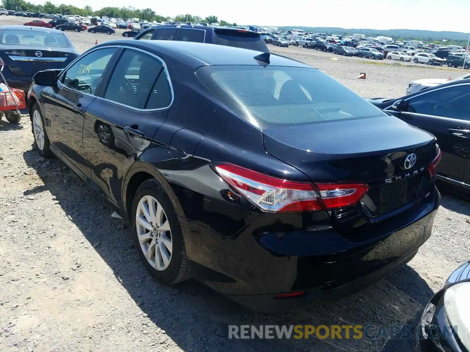 3 Photograph of a damaged car 4T1B11HK4KU751918 TOYOTA CAMRY 2019