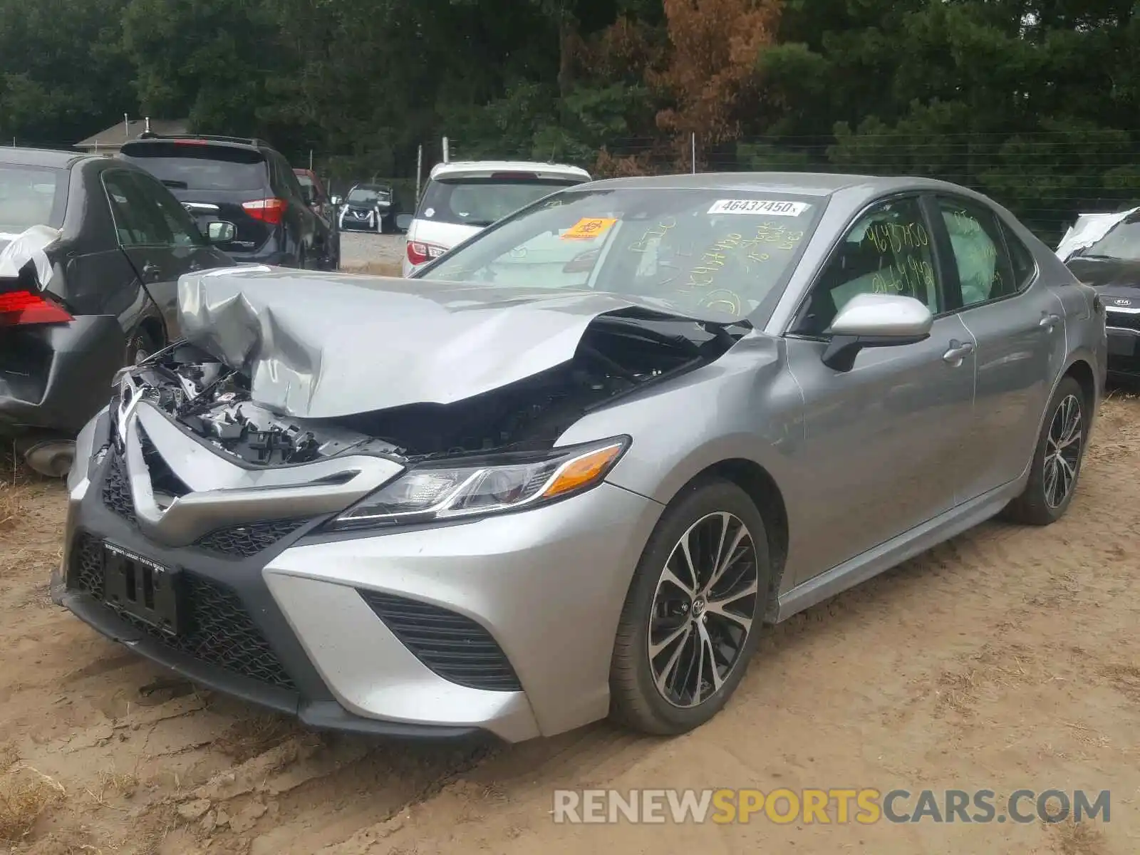 2 Photograph of a damaged car 4T1B11HK4KU752454 TOYOTA CAMRY 2019