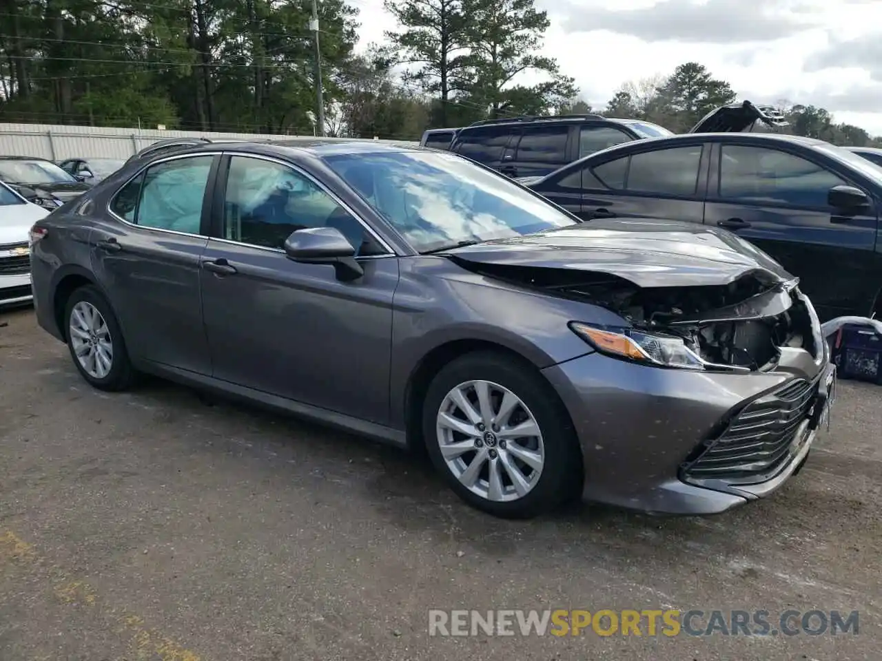 4 Photograph of a damaged car 4T1B11HK4KU752907 TOYOTA CAMRY 2019