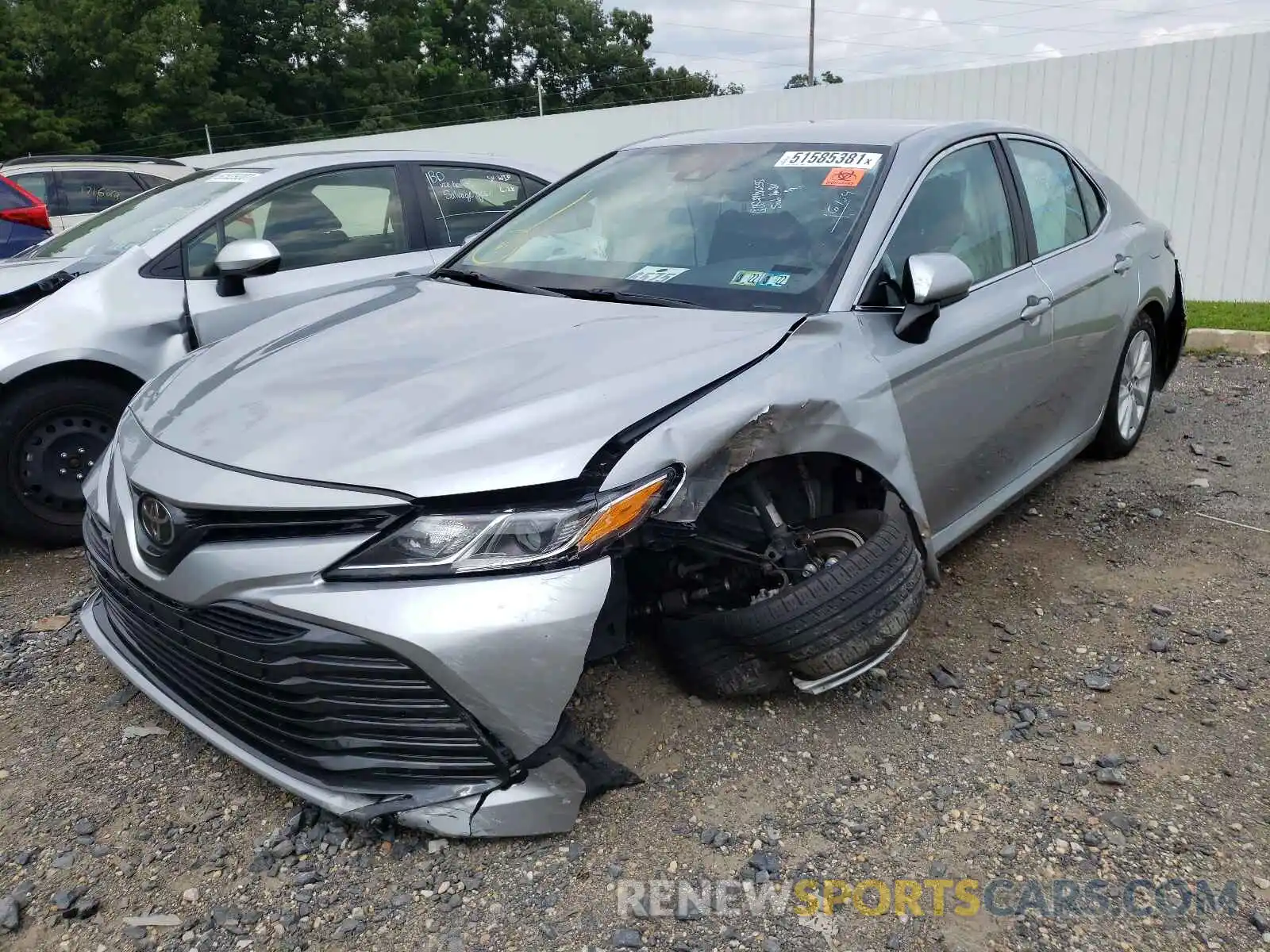 2 Photograph of a damaged car 4T1B11HK4KU753670 TOYOTA CAMRY 2019