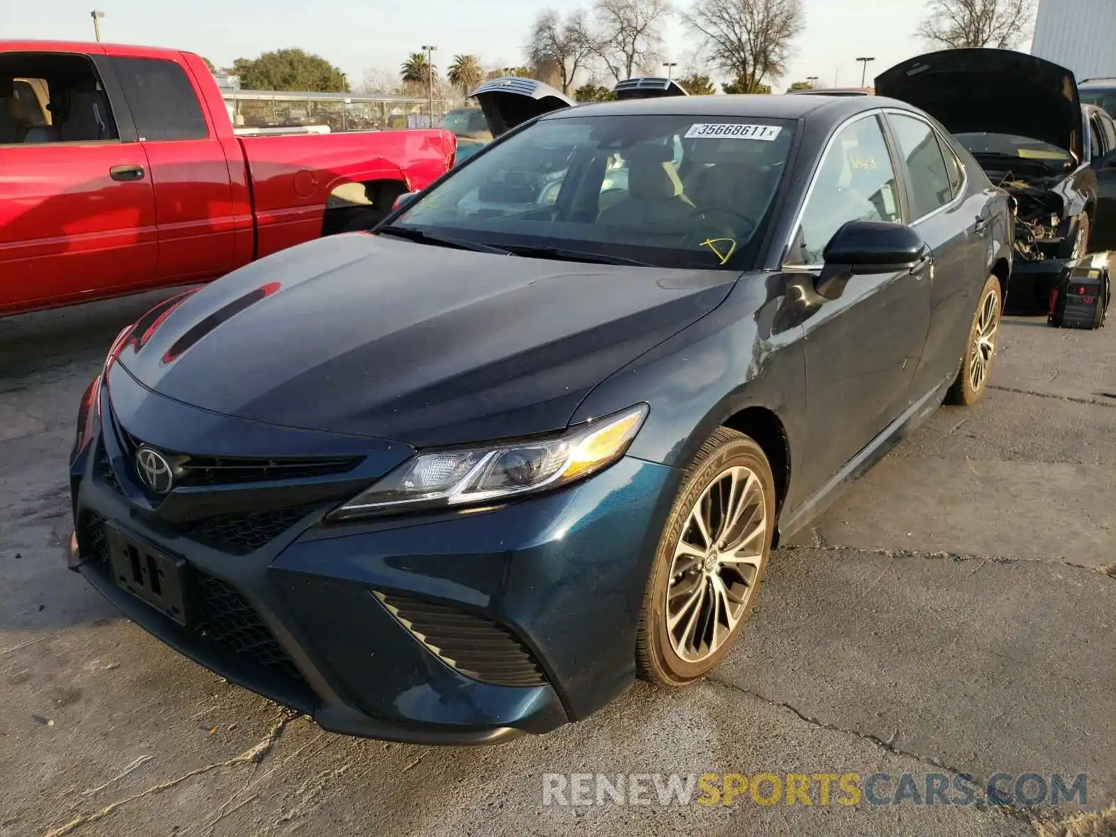 2 Photograph of a damaged car 4T1B11HK4KU753751 TOYOTA CAMRY 2019