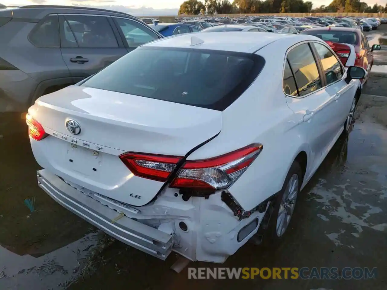 4 Photograph of a damaged car 4T1B11HK4KU753913 TOYOTA CAMRY 2019