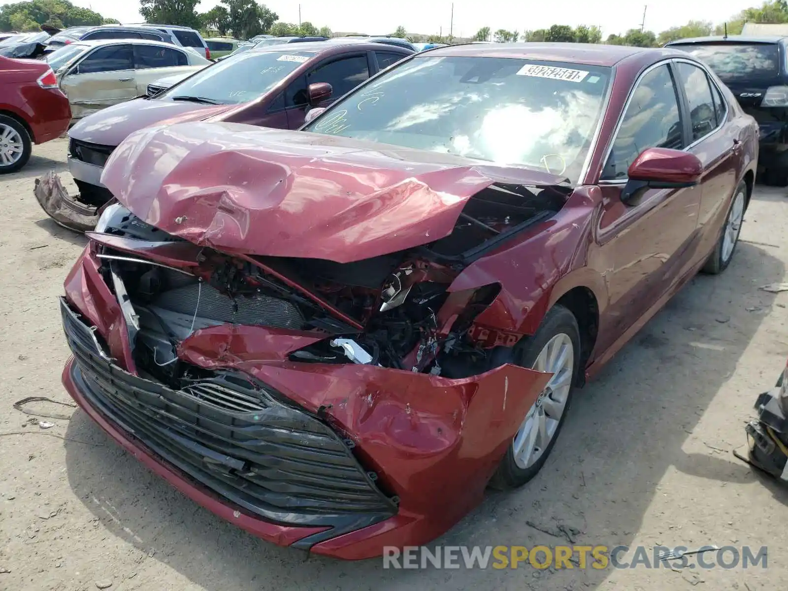 2 Photograph of a damaged car 4T1B11HK4KU755547 TOYOTA CAMRY 2019