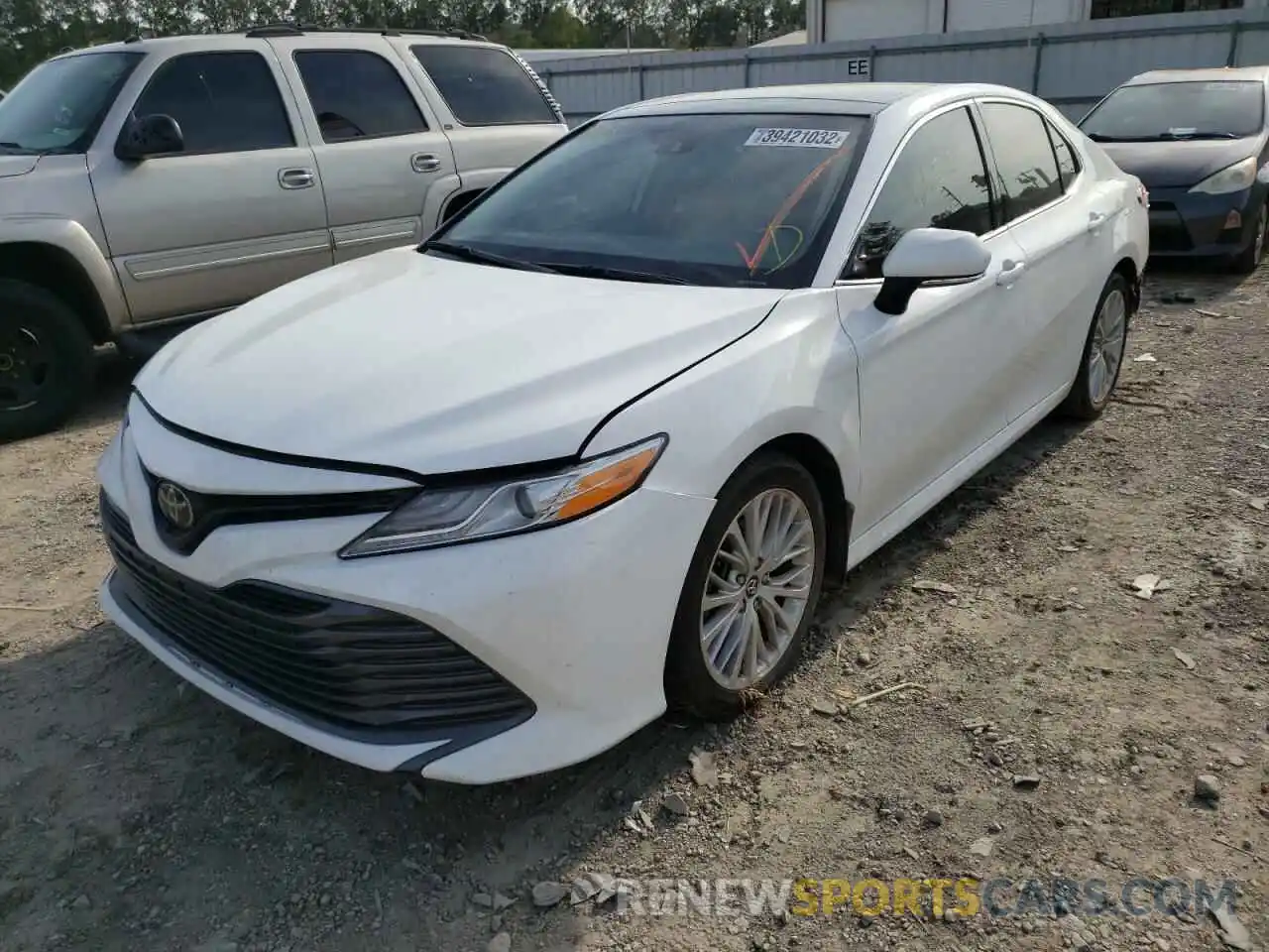 2 Photograph of a damaged car 4T1B11HK4KU757069 TOYOTA CAMRY 2019