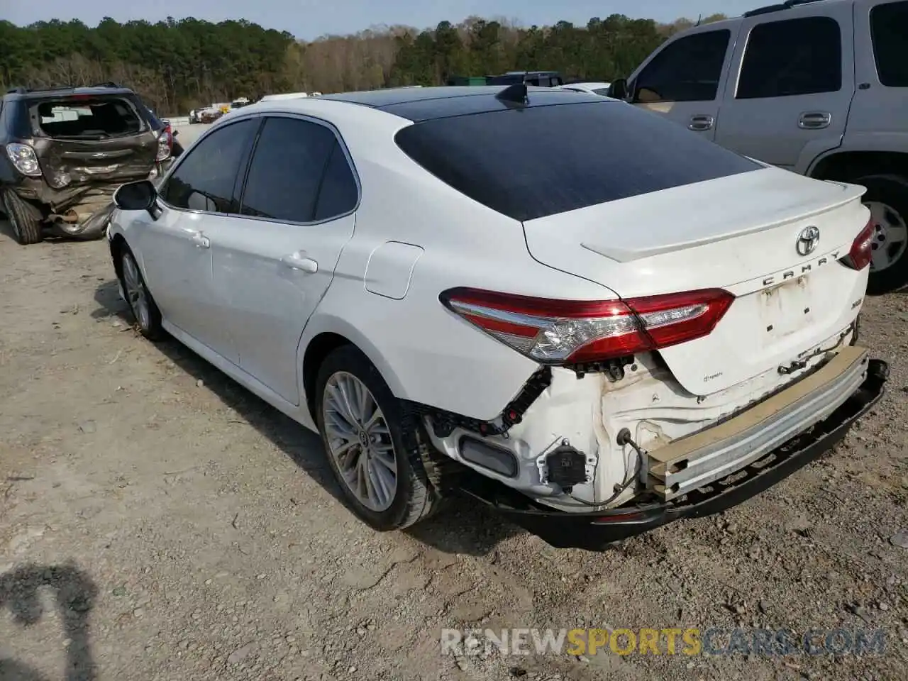 3 Photograph of a damaged car 4T1B11HK4KU757069 TOYOTA CAMRY 2019