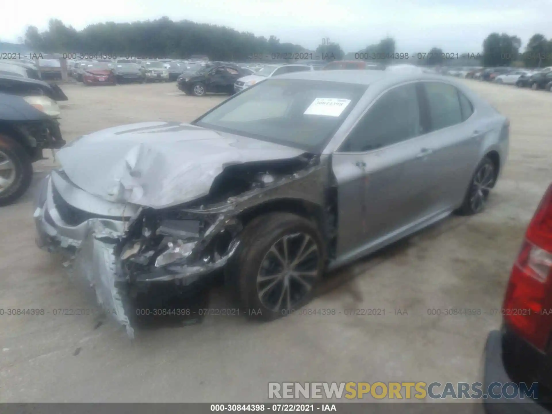 2 Photograph of a damaged car 4T1B11HK4KU757587 TOYOTA CAMRY 2019