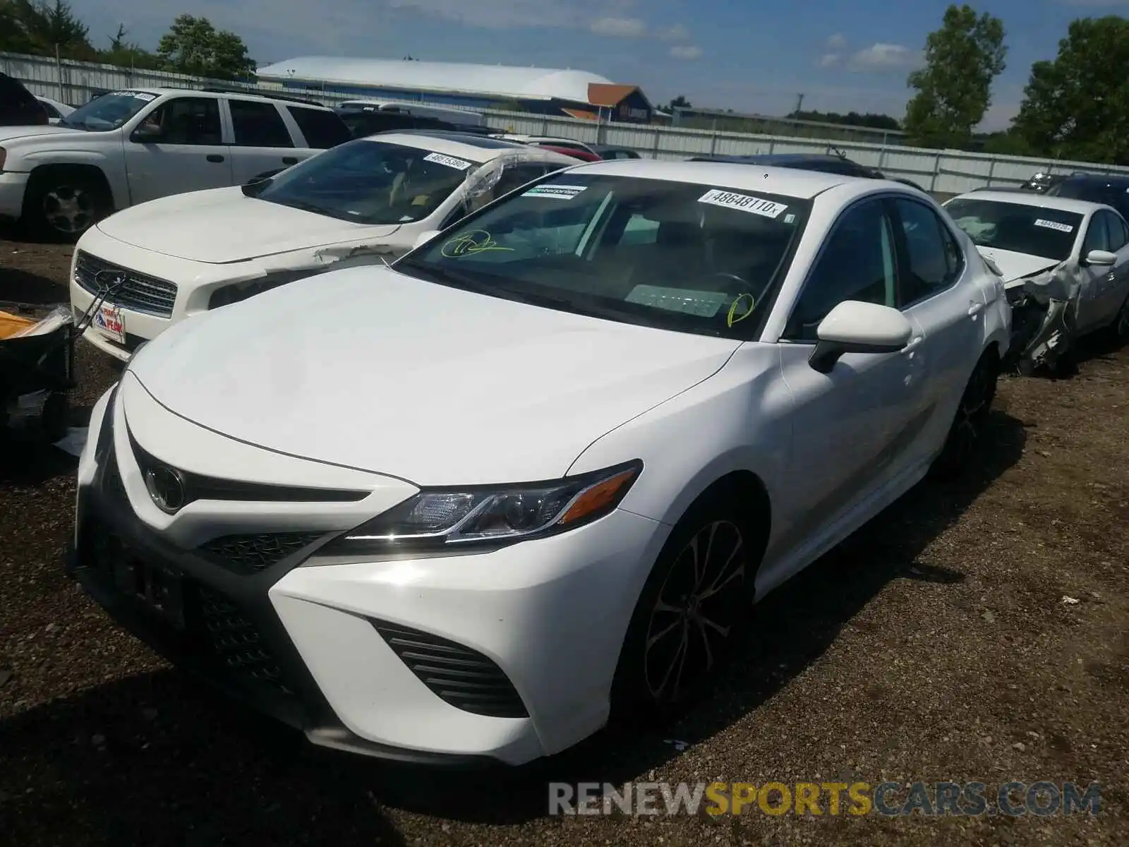 2 Photograph of a damaged car 4T1B11HK4KU758075 TOYOTA CAMRY 2019