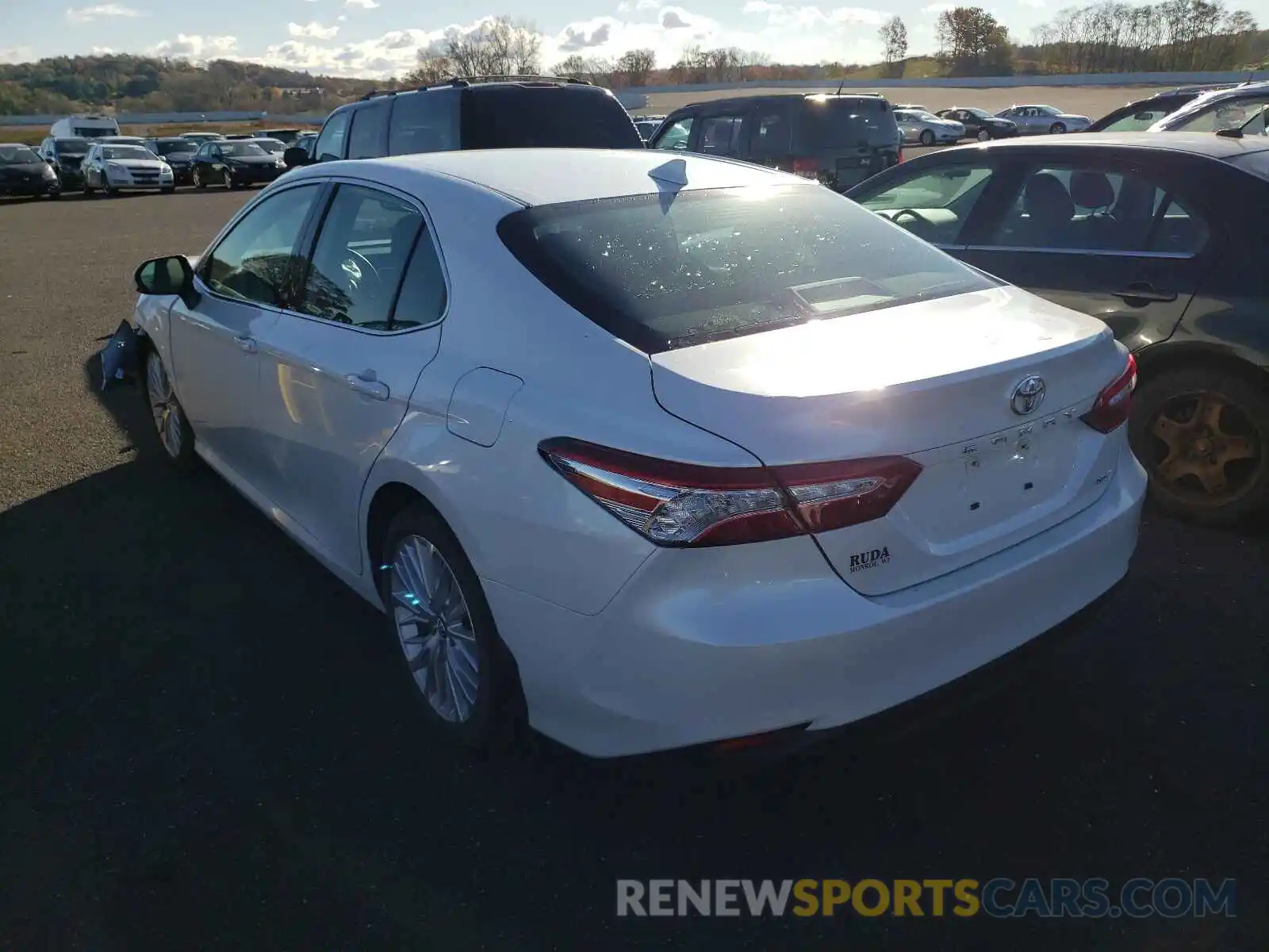 3 Photograph of a damaged car 4T1B11HK4KU761042 TOYOTA CAMRY 2019