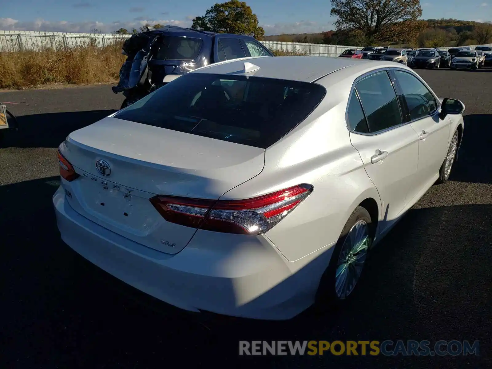 4 Photograph of a damaged car 4T1B11HK4KU761042 TOYOTA CAMRY 2019