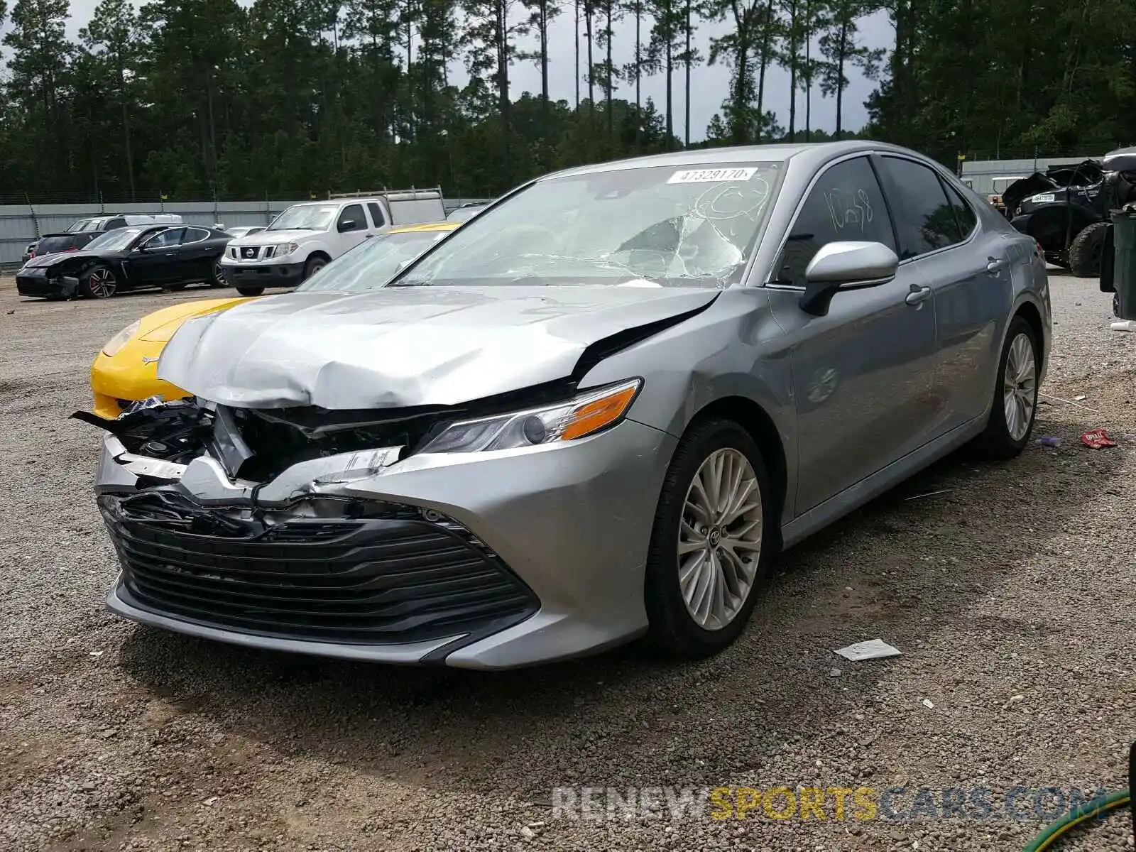 2 Photograph of a damaged car 4T1B11HK4KU761591 TOYOTA CAMRY 2019