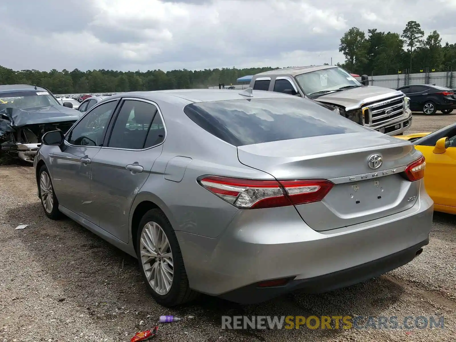 3 Photograph of a damaged car 4T1B11HK4KU761591 TOYOTA CAMRY 2019