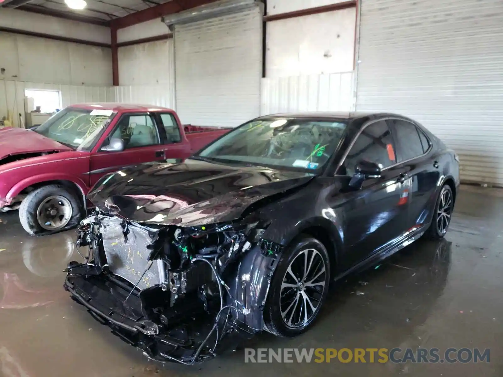 2 Photograph of a damaged car 4T1B11HK4KU762692 TOYOTA CAMRY 2019