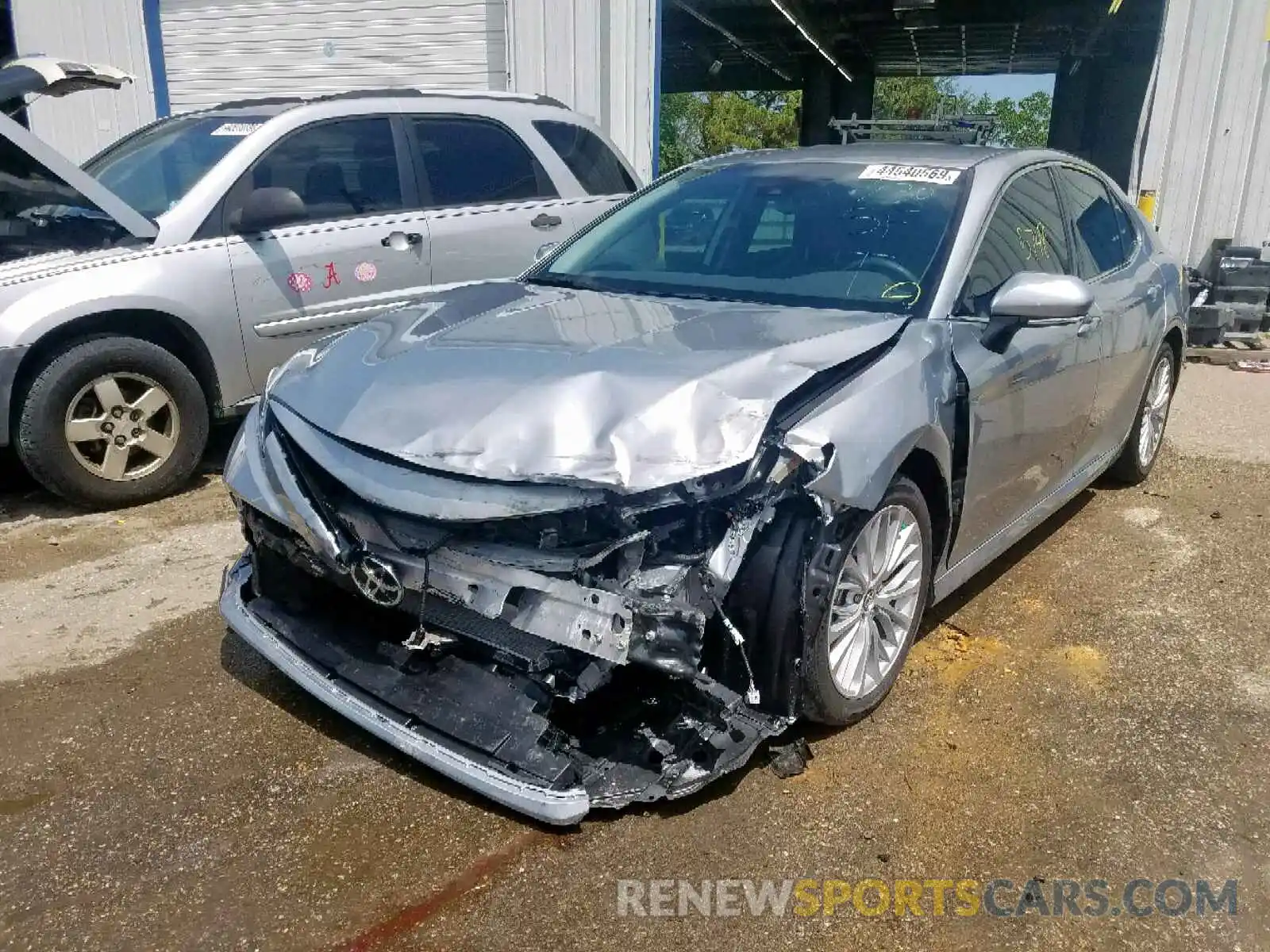 2 Photograph of a damaged car 4T1B11HK4KU763339 TOYOTA CAMRY 2019