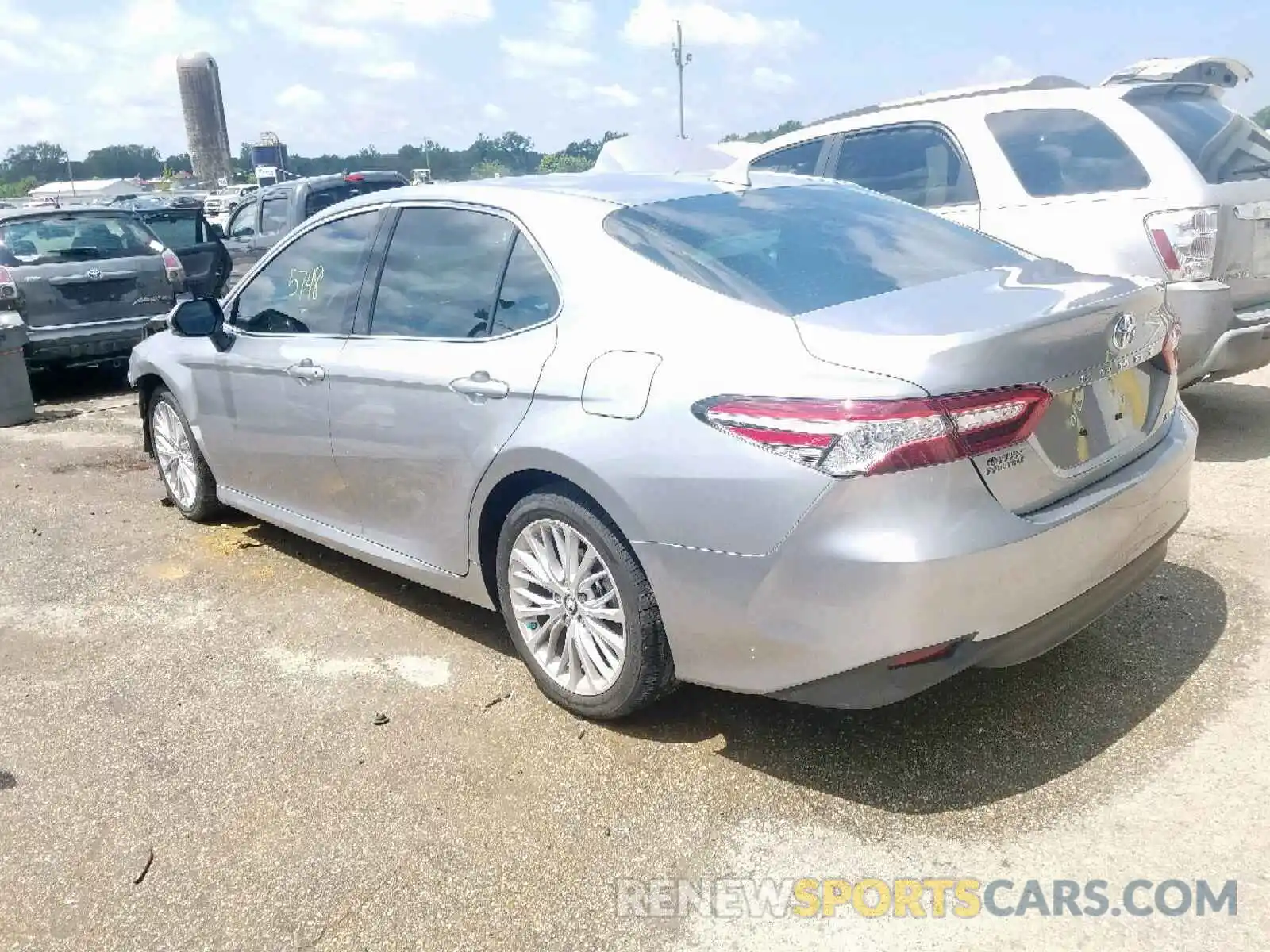 3 Photograph of a damaged car 4T1B11HK4KU763339 TOYOTA CAMRY 2019