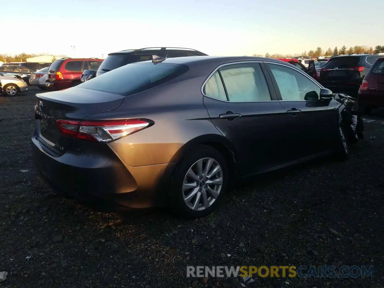 4 Photograph of a damaged car 4T1B11HK4KU765110 TOYOTA CAMRY 2019