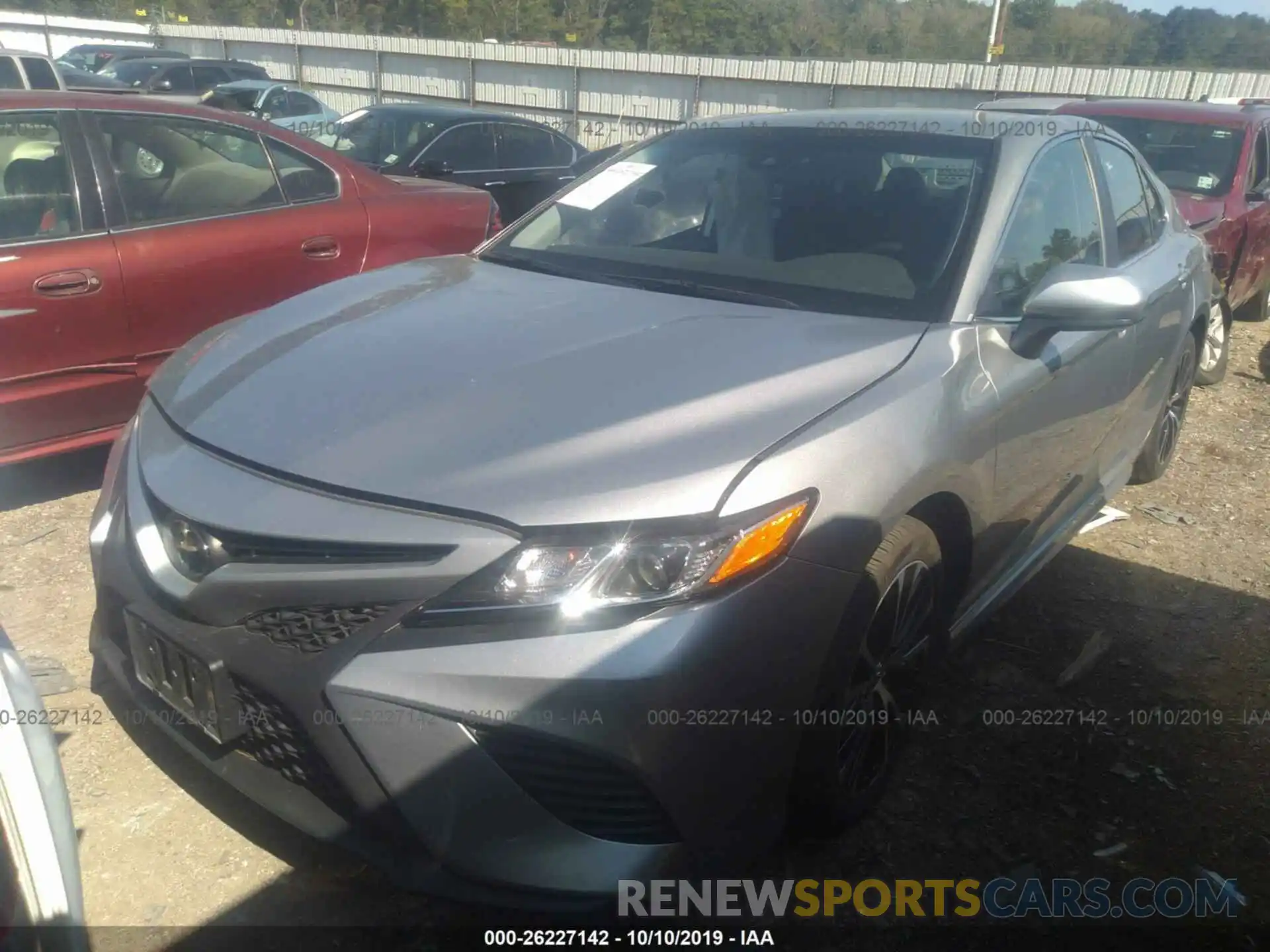 2 Photograph of a damaged car 4T1B11HK4KU765527 TOYOTA CAMRY 2019