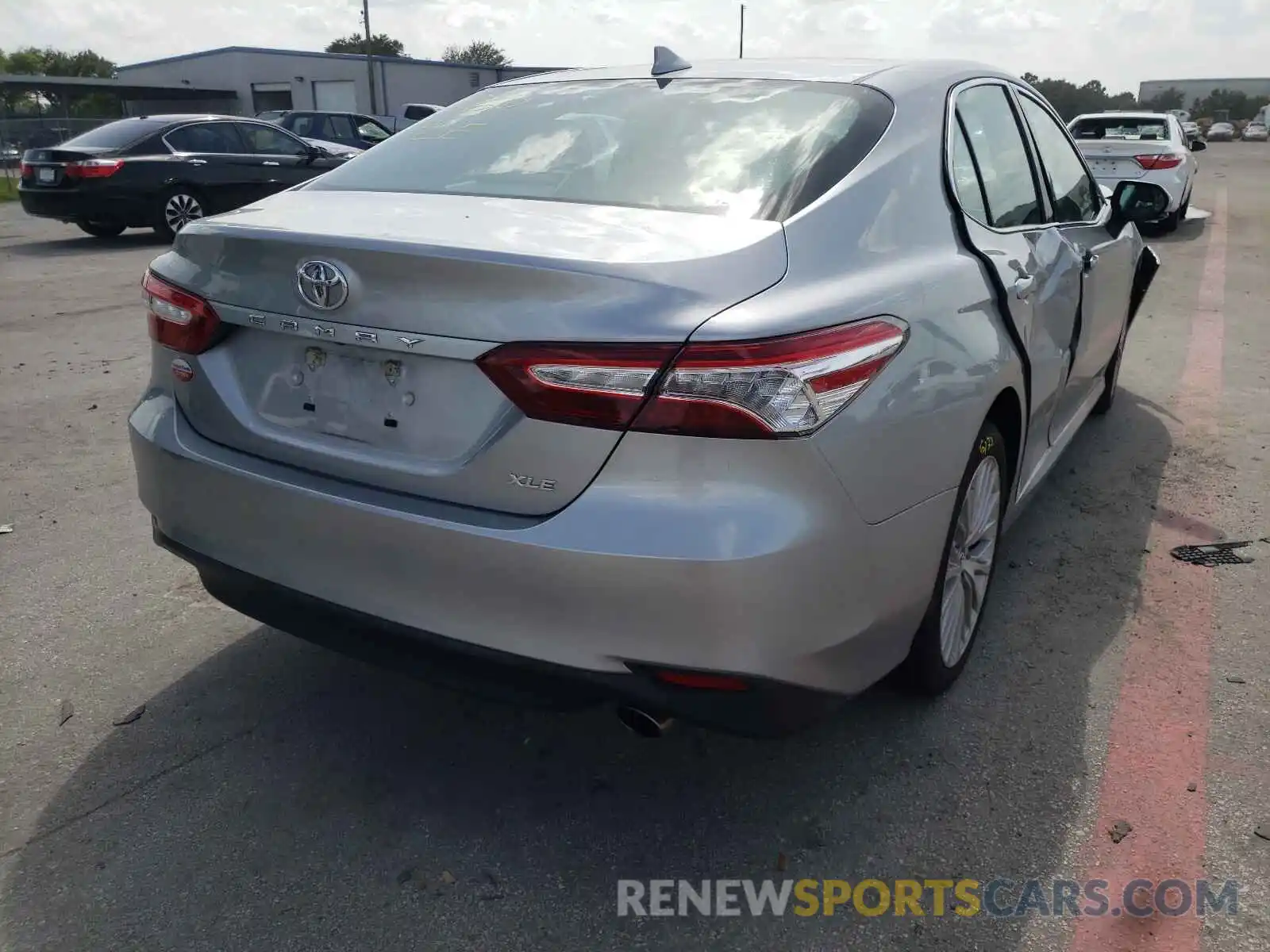 4 Photograph of a damaged car 4T1B11HK4KU766449 TOYOTA CAMRY 2019