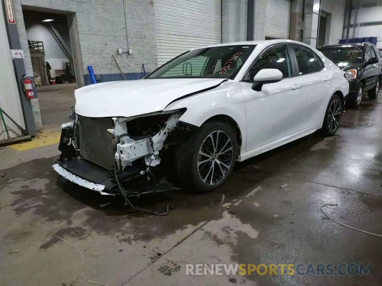 2 Photograph of a damaged car 4T1B11HK4KU768332 TOYOTA CAMRY 2019