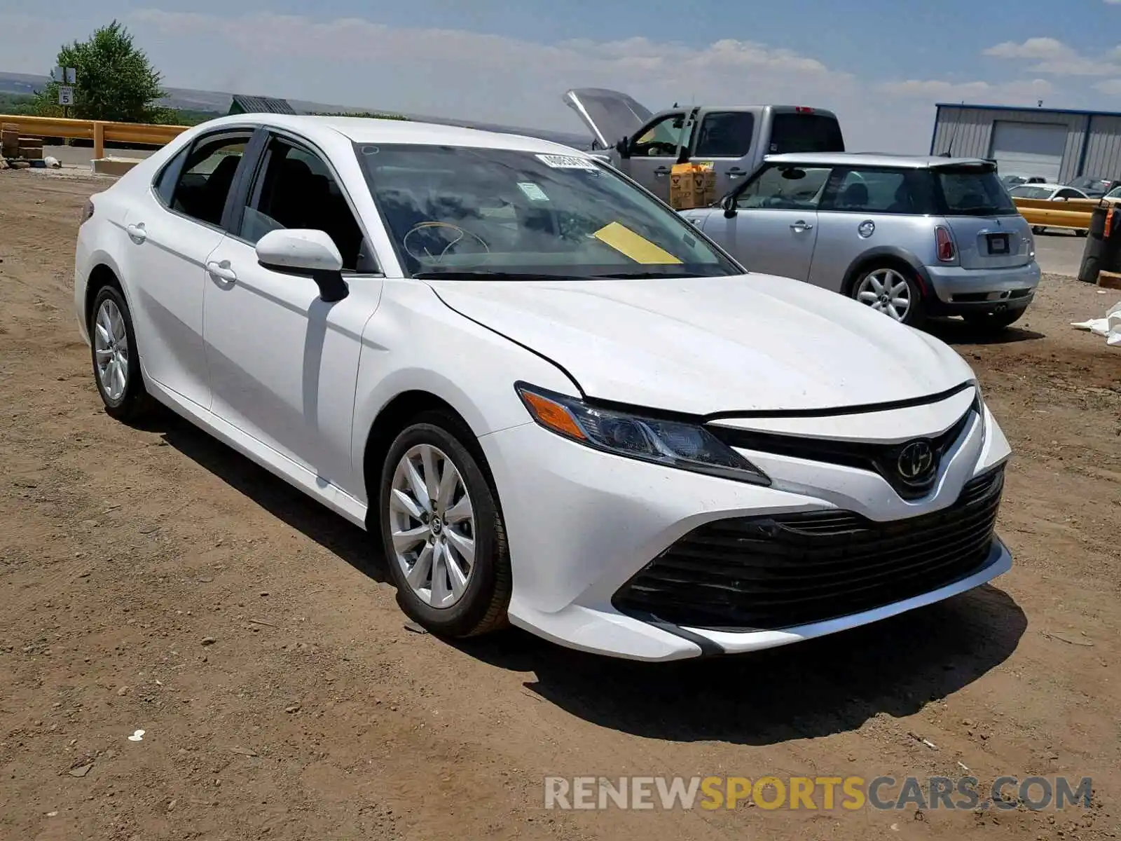 1 Photograph of a damaged car 4T1B11HK4KU769237 TOYOTA CAMRY 2019