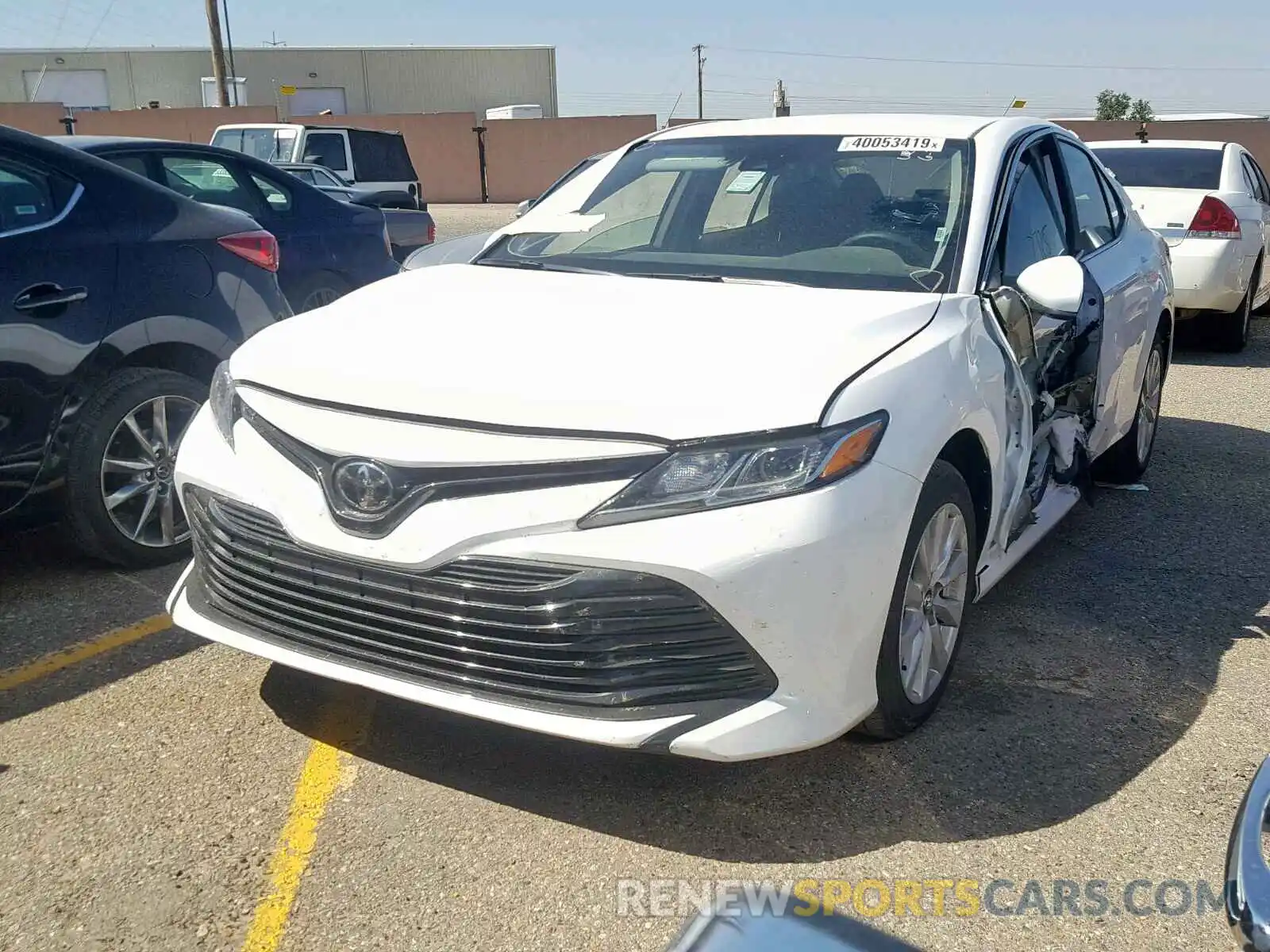 2 Photograph of a damaged car 4T1B11HK4KU769237 TOYOTA CAMRY 2019