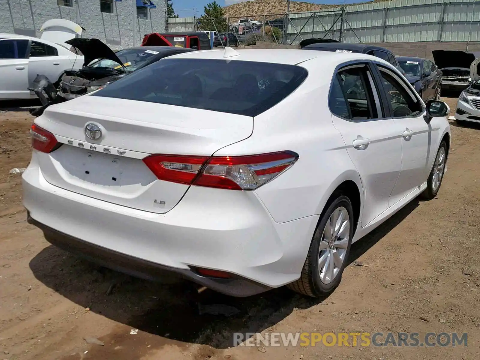 4 Photograph of a damaged car 4T1B11HK4KU769237 TOYOTA CAMRY 2019