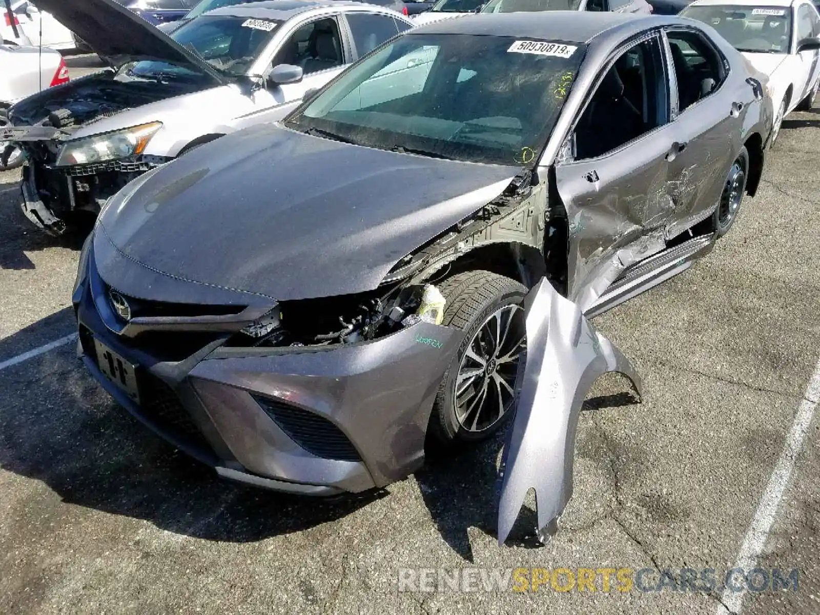 2 Photograph of a damaged car 4T1B11HK4KU769299 TOYOTA CAMRY 2019