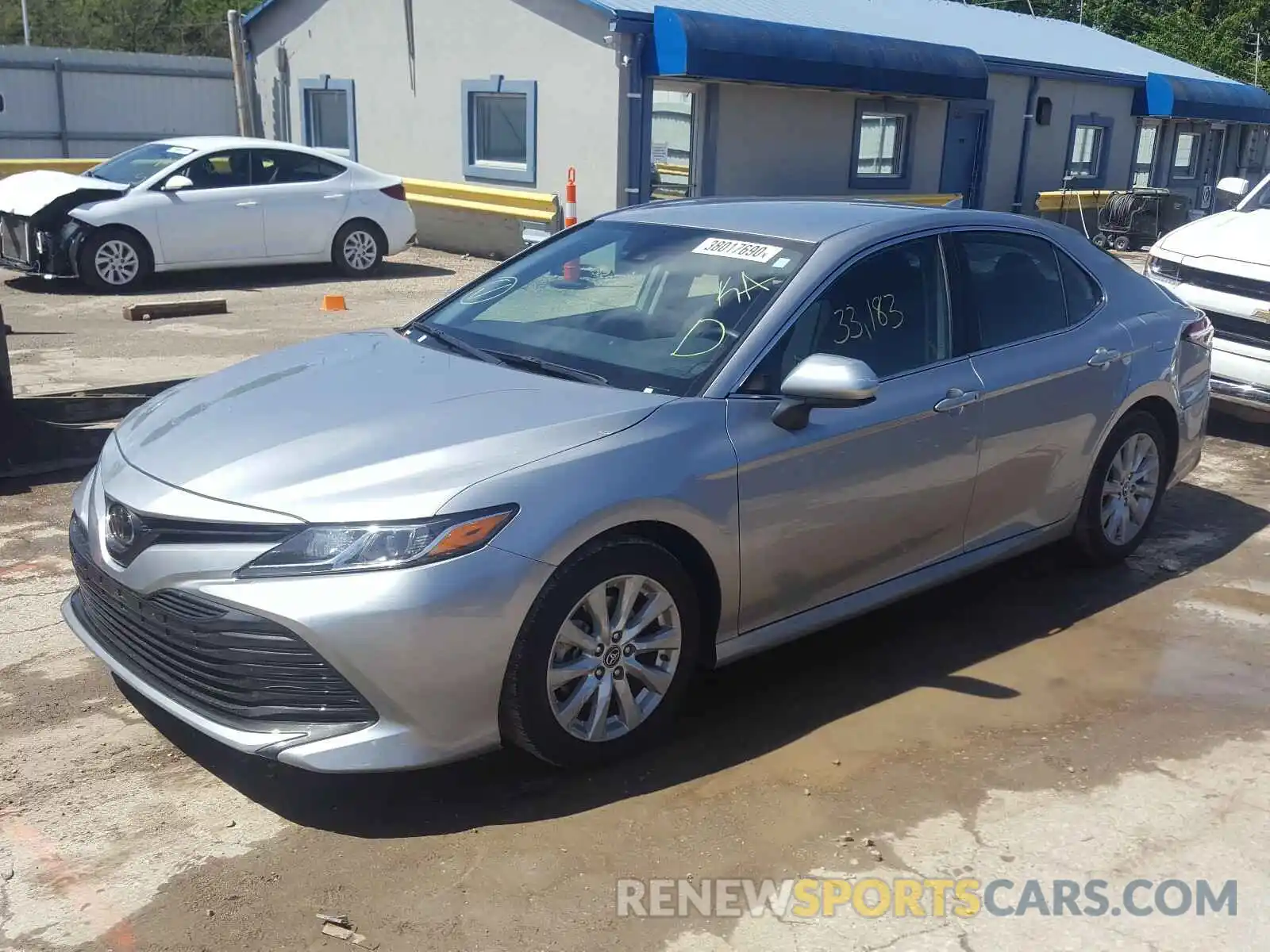 2 Photograph of a damaged car 4T1B11HK4KU770629 TOYOTA CAMRY 2019