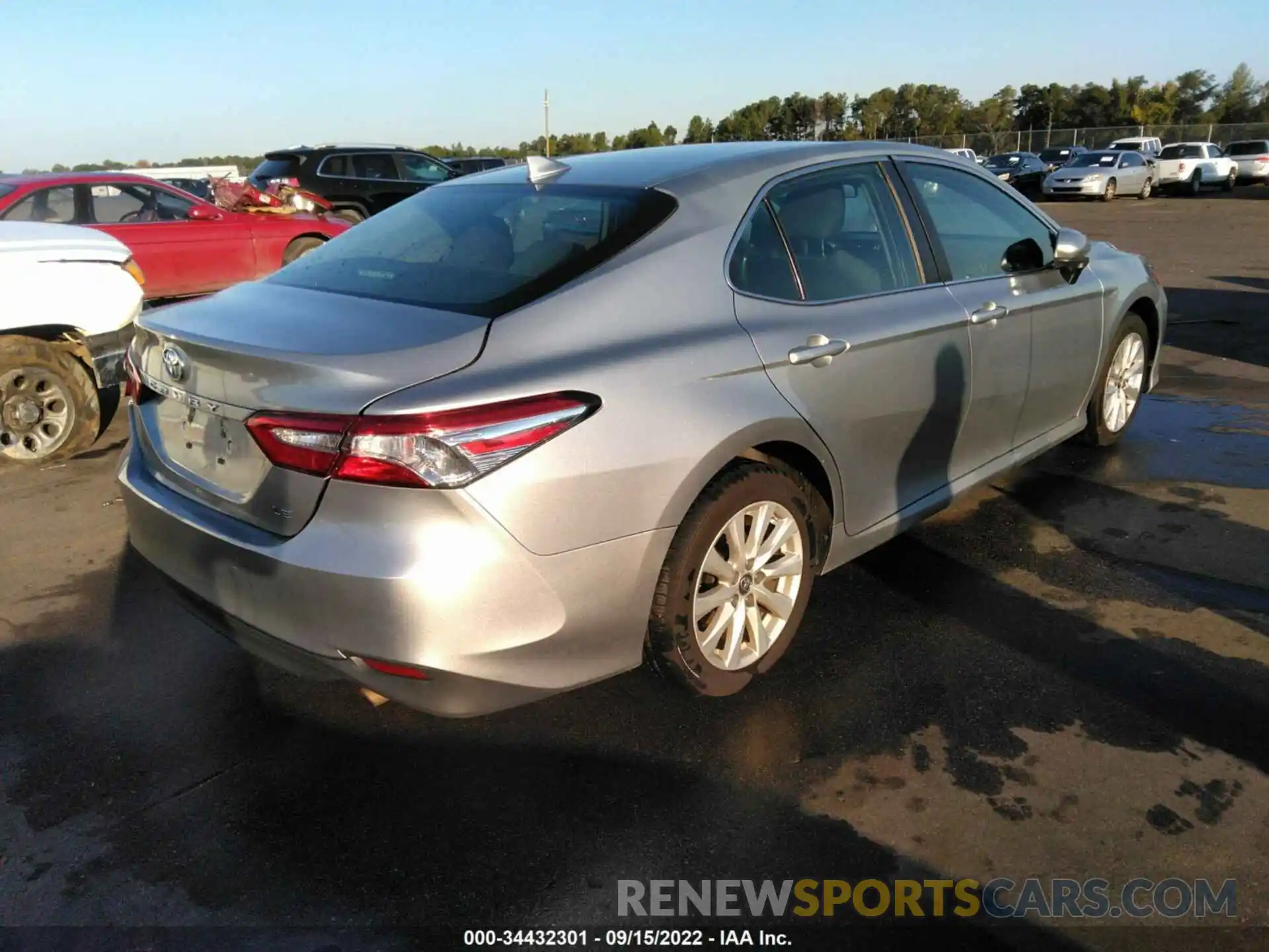 4 Photograph of a damaged car 4T1B11HK4KU770677 TOYOTA CAMRY 2019