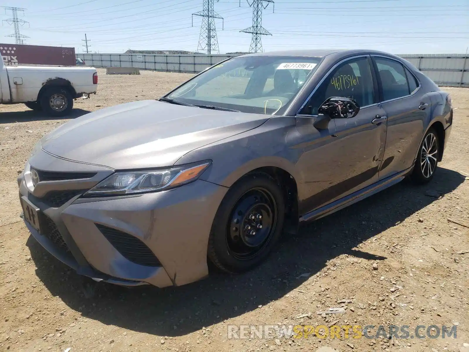 2 Photograph of a damaged car 4T1B11HK4KU771022 TOYOTA CAMRY 2019