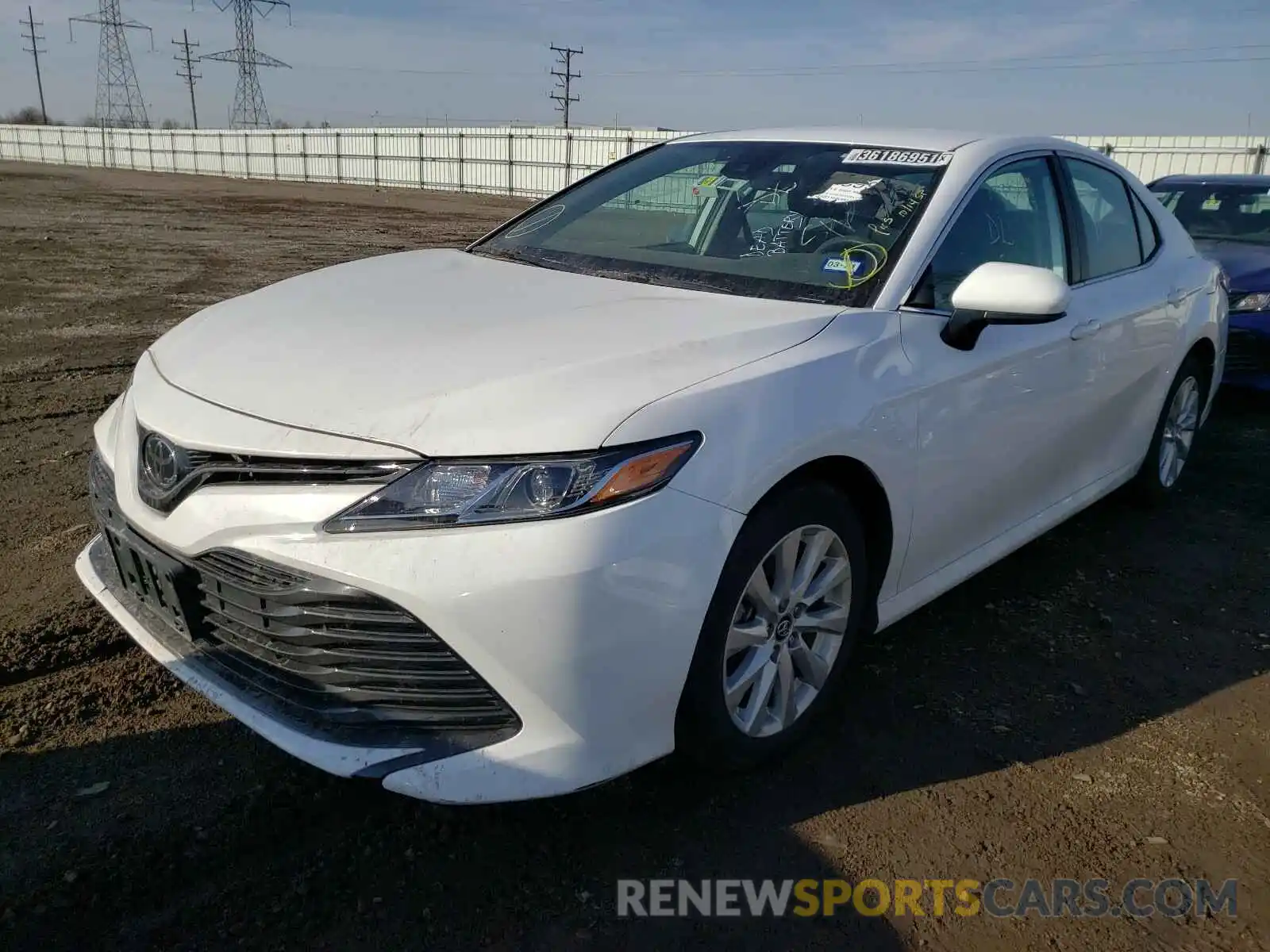 2 Photograph of a damaged car 4T1B11HK4KU771540 TOYOTA CAMRY 2019