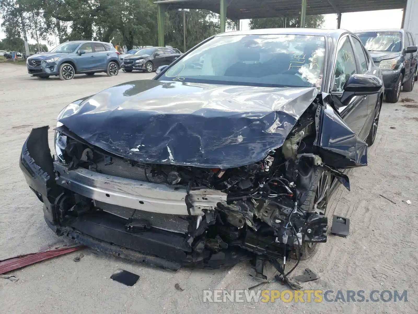 9 Photograph of a damaged car 4T1B11HK4KU772087 TOYOTA CAMRY 2019