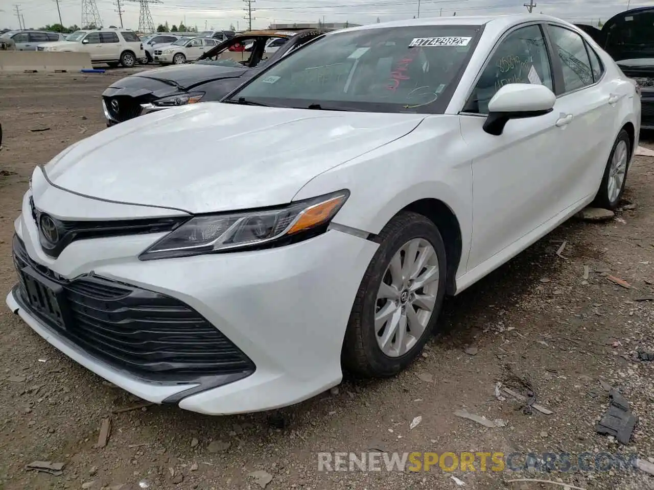 2 Photograph of a damaged car 4T1B11HK4KU773837 TOYOTA CAMRY 2019