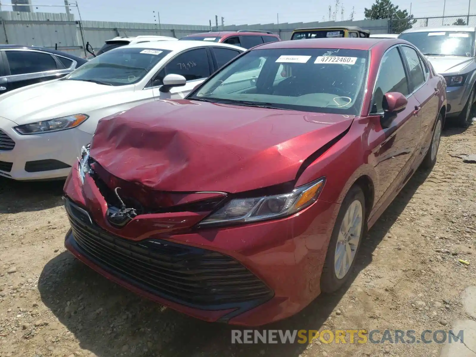 2 Photograph of a damaged car 4T1B11HK4KU774387 TOYOTA CAMRY 2019