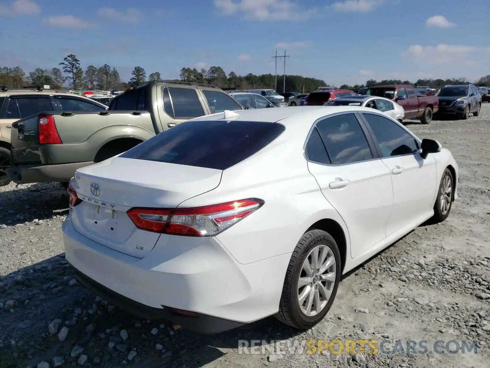 4 Photograph of a damaged car 4T1B11HK4KU774437 TOYOTA CAMRY 2019